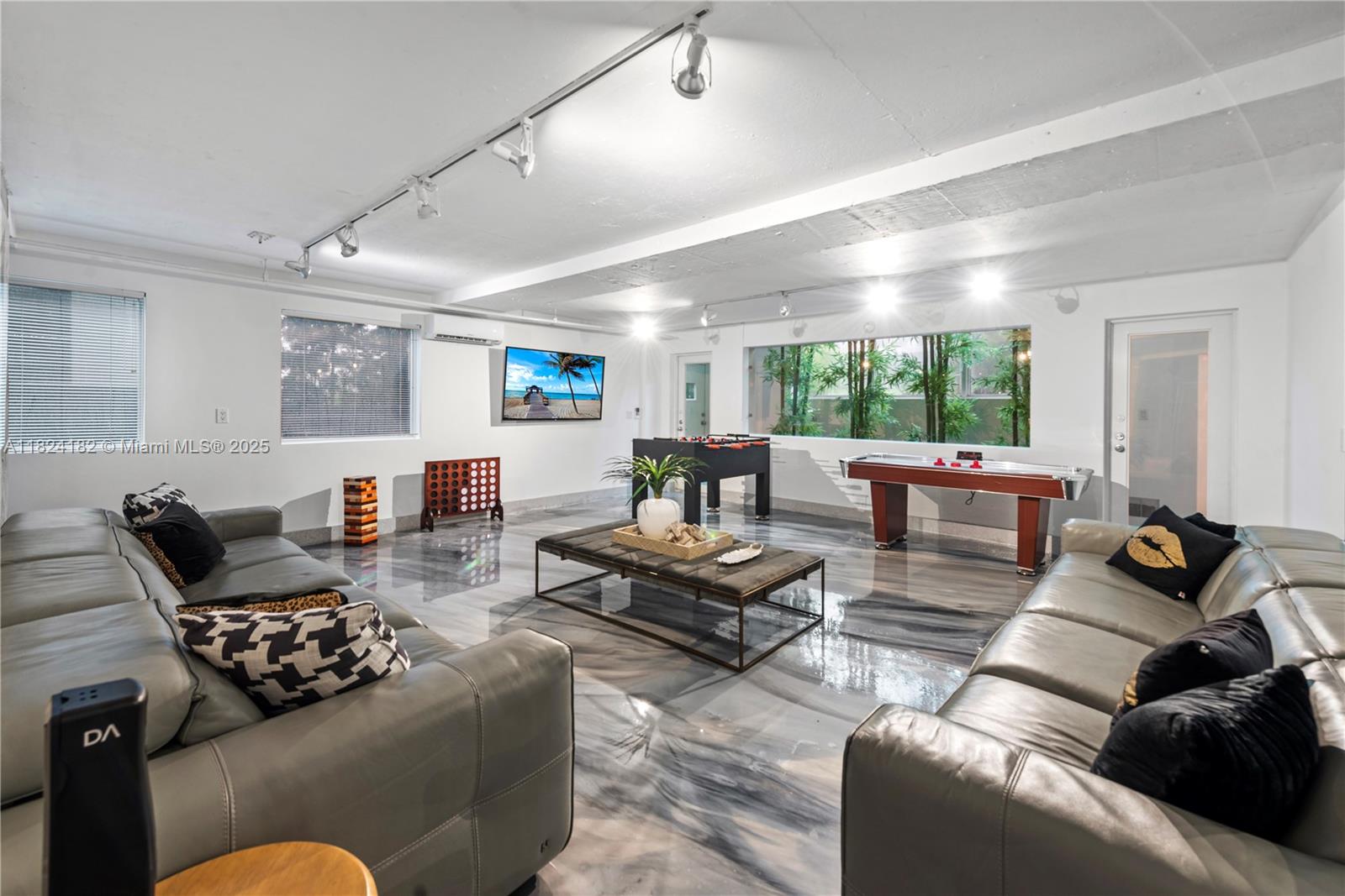 1606 South Bayshore Drive Miami, FL 33133 - Photo 16 of 54 a living room with furniture and a large window