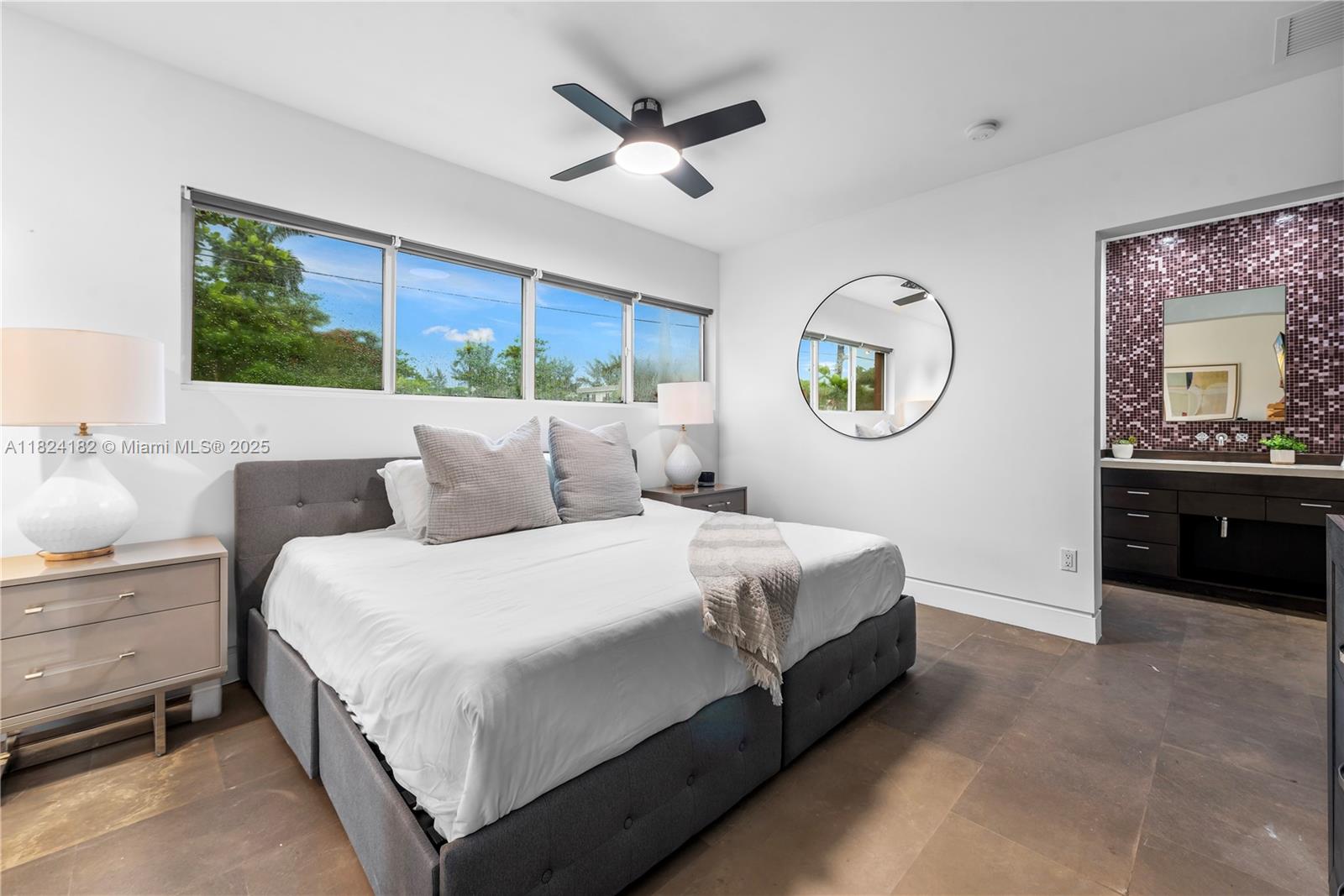 1606 South Bayshore Drive Miami, FL 33133 - Photo 38 of 54 a bedroom with a bed and a large window