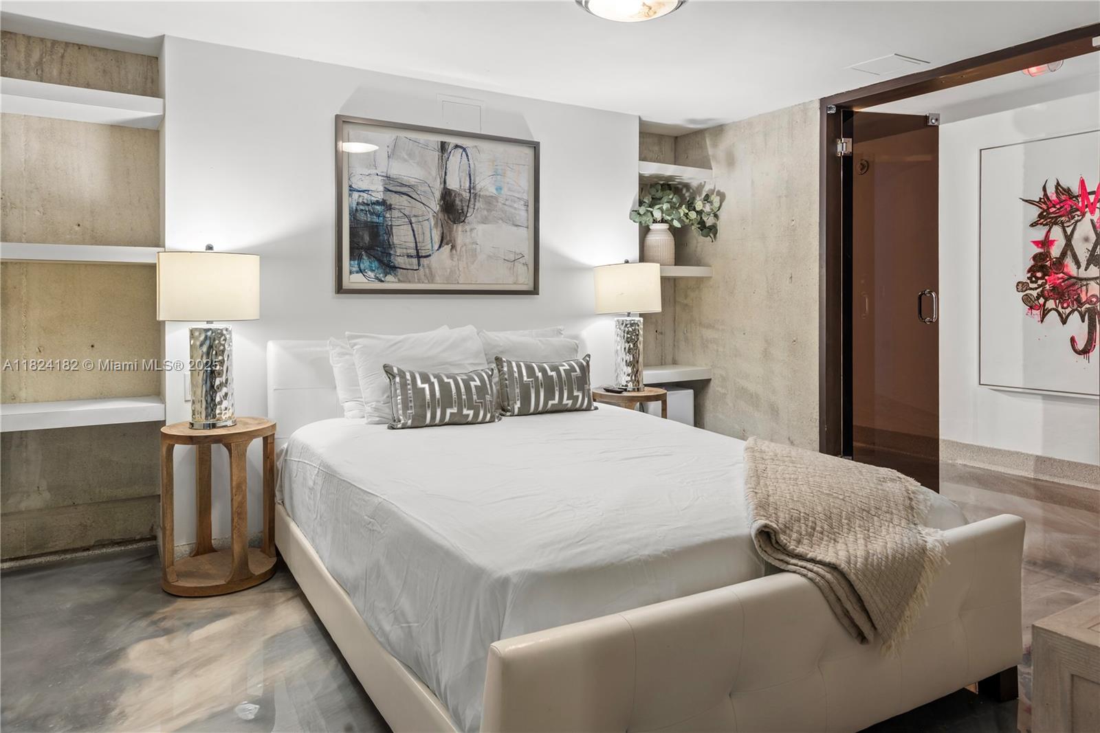 1606 South Bayshore Drive Miami, FL 33133 - Photo 47 of 54 a bed room with a bed and a painting on the wall