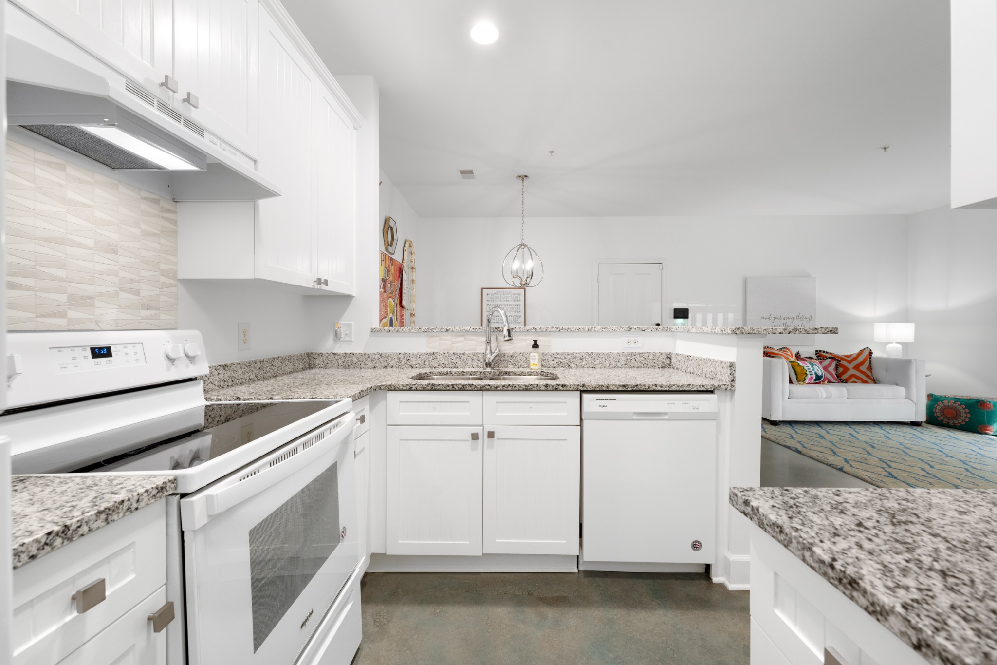 7219 Althorp Way, Unit L4 Nashville, TN 37211 - Photo 16 of 36 a kitchen with granite countertop cabinets stainless steel appliances and a counter space