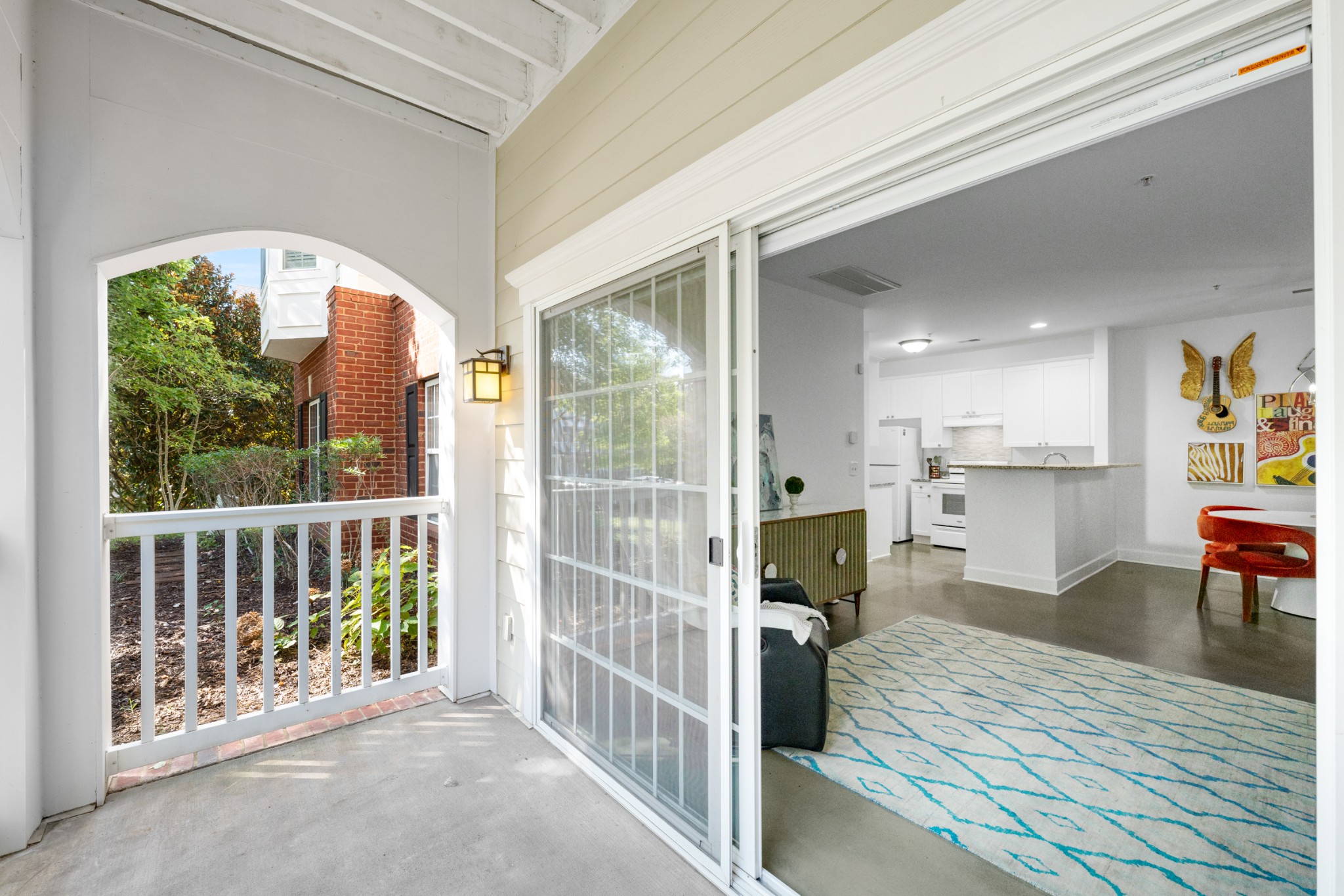 7219 Althorp Way, Unit L4 Nashville, TN 37211 - Photo 31 of 36 a view of a living room and a balcony