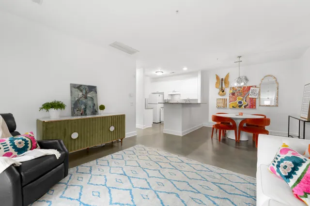 a living room with furniture and a couch