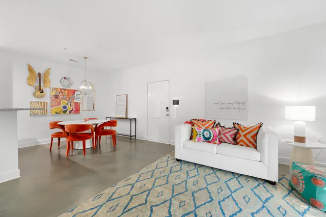 a bedroom with furniture and a couch