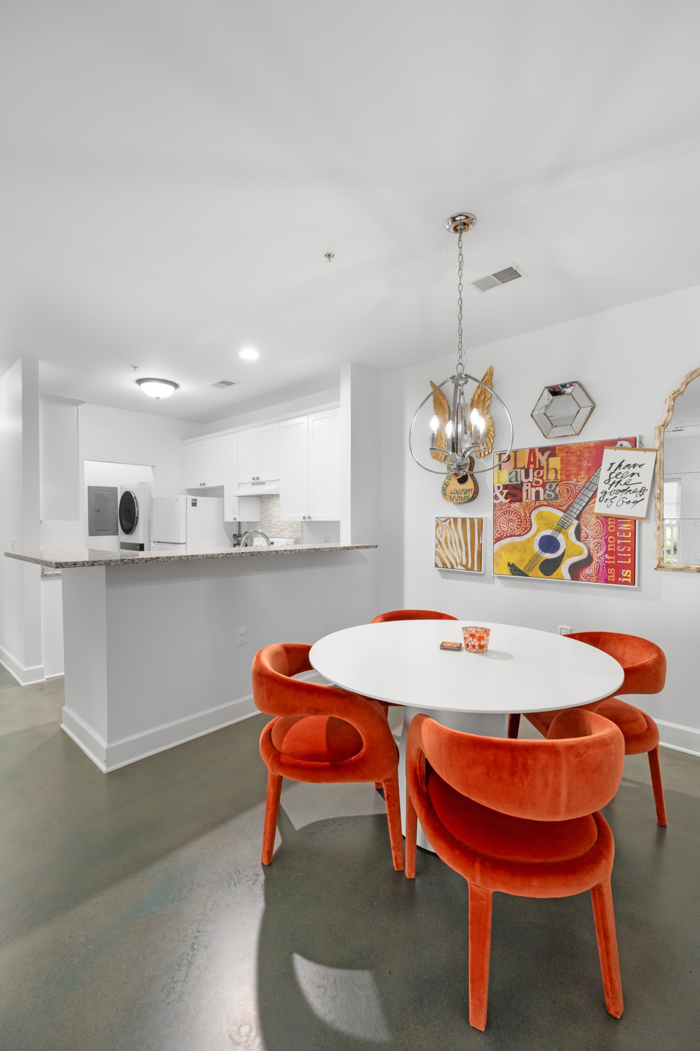 7219 Althorp Way, Unit L4 Nashville, TN 37211 - Photo 9 of 36 a dining room with a table chairs and a kitchen