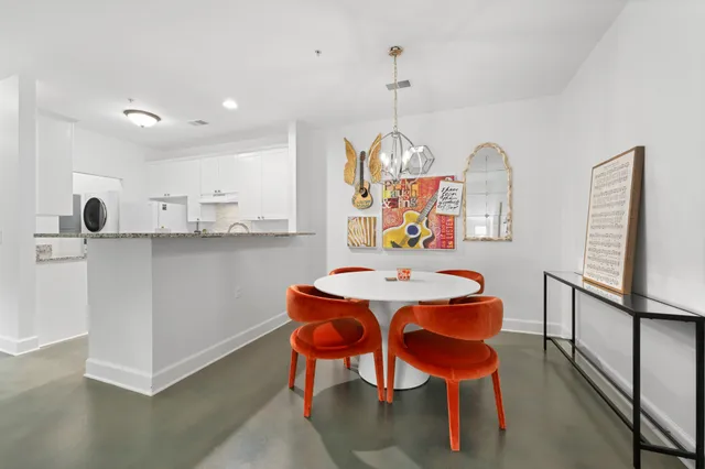 a view of a dining room with furniture