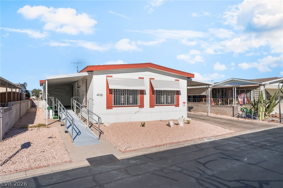 4980 Ridge Drive Las Vegas, NV 89103 - Photo 26 of 36 Manufactured / mobile home with a carport