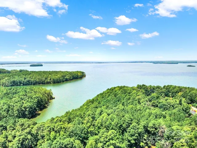 a view of a lake with a yard