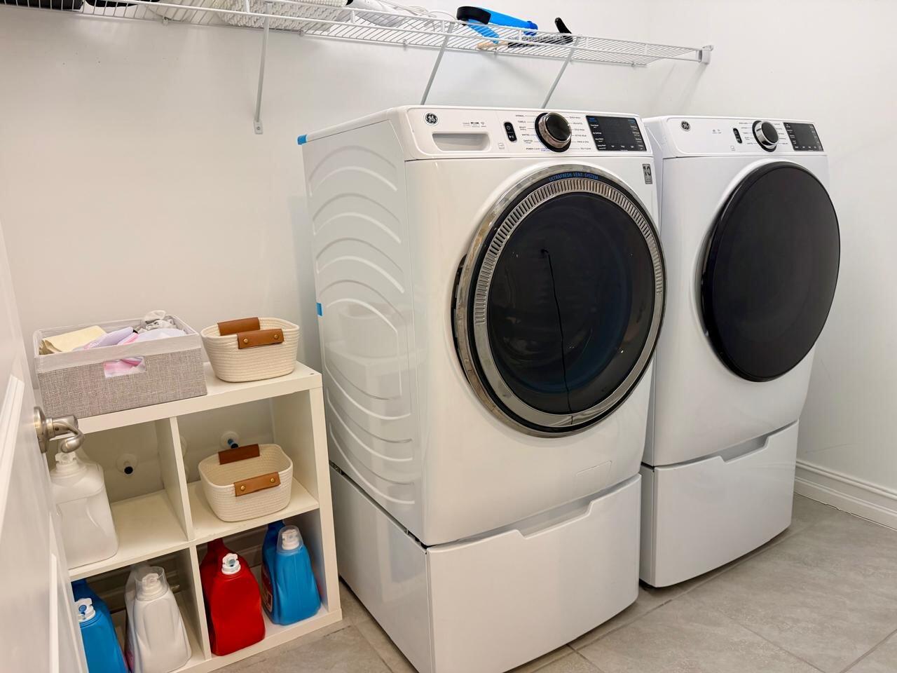 9420 Kinley Place Boca Raton, FL 33428 - Photo 15 of 17 a utility room with dryer and washer