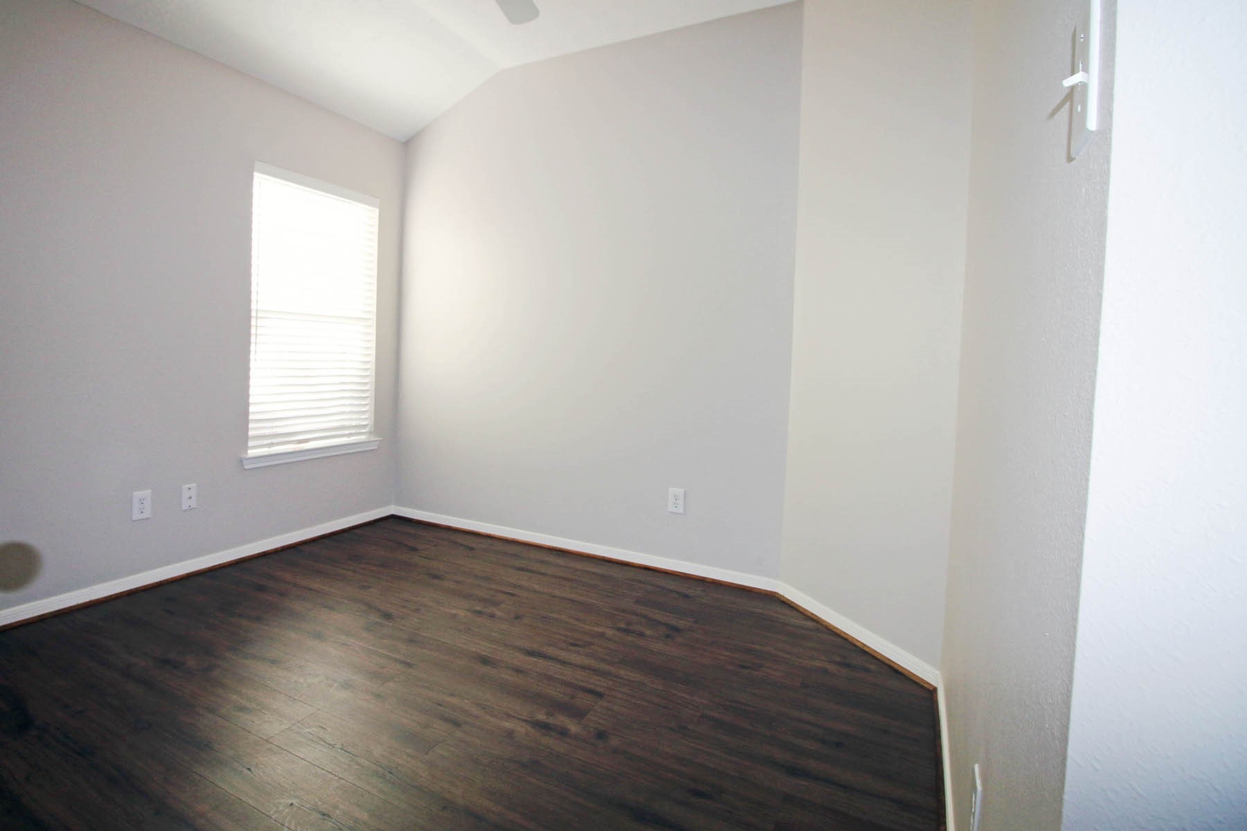 21743 May Apple Court Cypress, TX 77433 - Photo 11 of 15 an empty room with wooden floor and windows