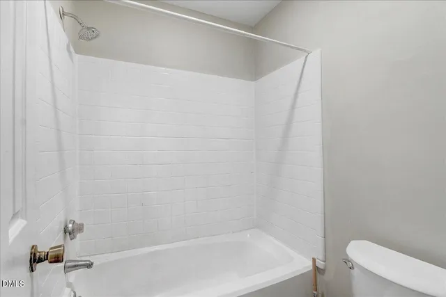 a bathroom with a sink and a mirror with toilet