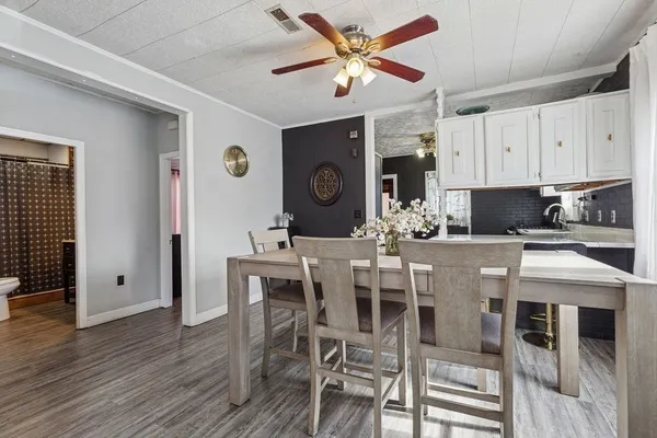 a view of a dining room with furniture