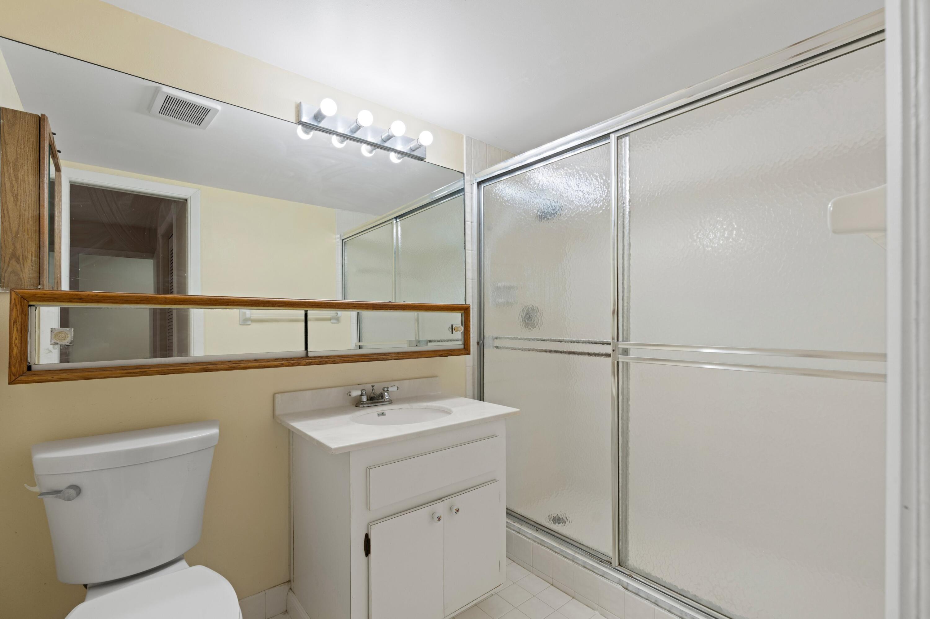 6850 Northwest 2nd Avenue, Unit 16 Boca Raton, FL 33487 - Photo 11 of 40 Primary Bathroom