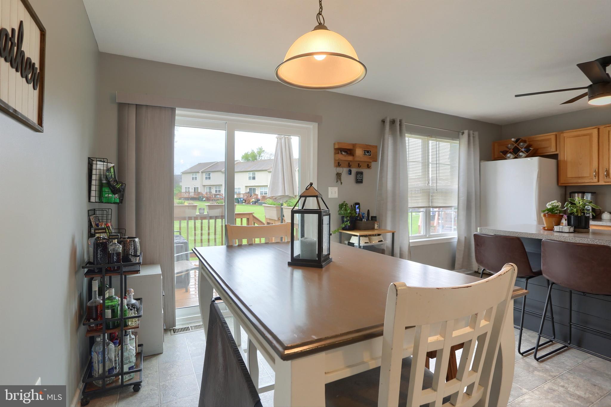 120 East Beaver Street York, PA 17406 - Photo 13 of 41 a dining table with chairs and potted plant