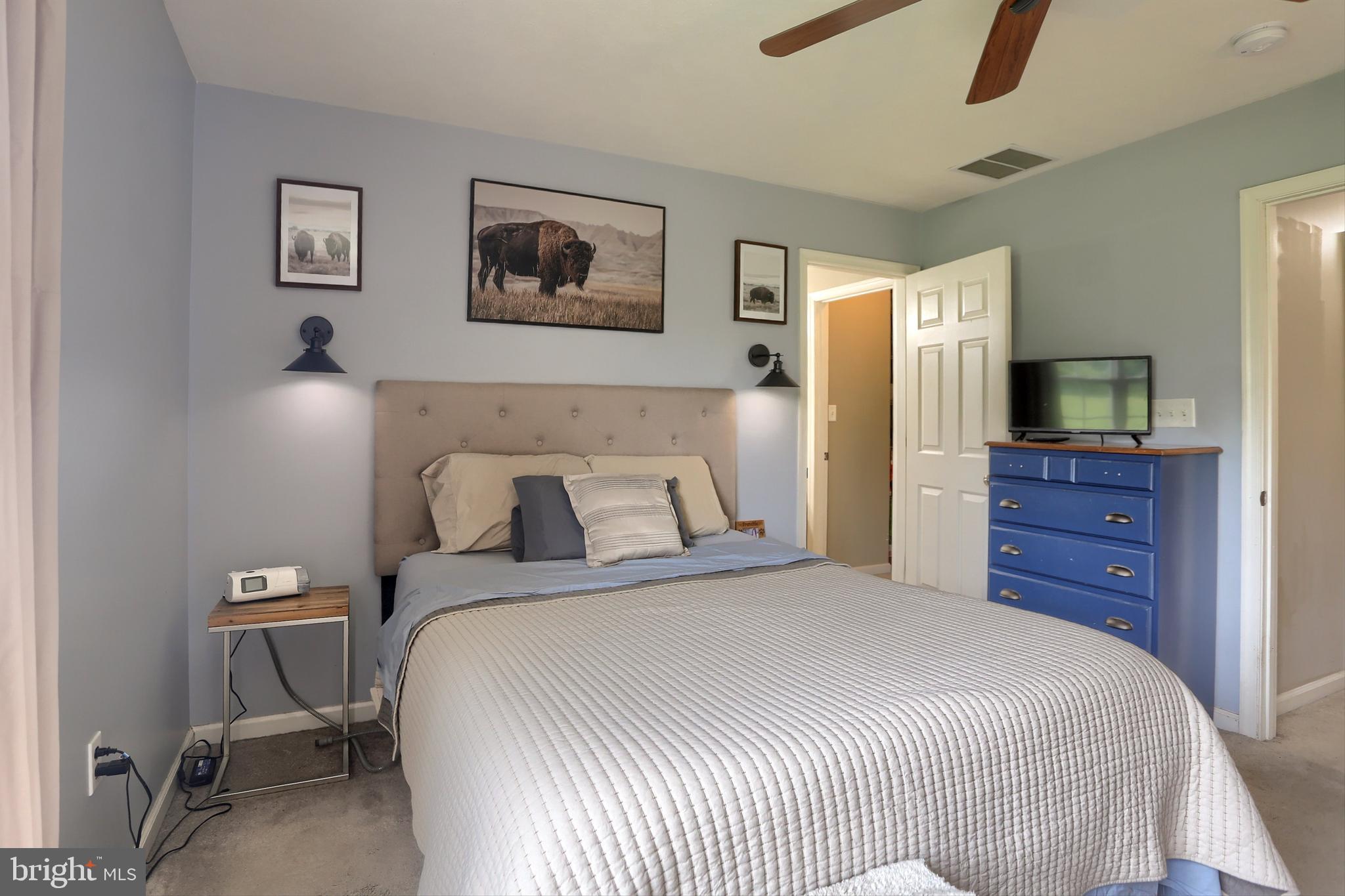 120 East Beaver Street York, PA 17406 - Photo 20 of 41 a bedroom with a bed and a flat screen tv