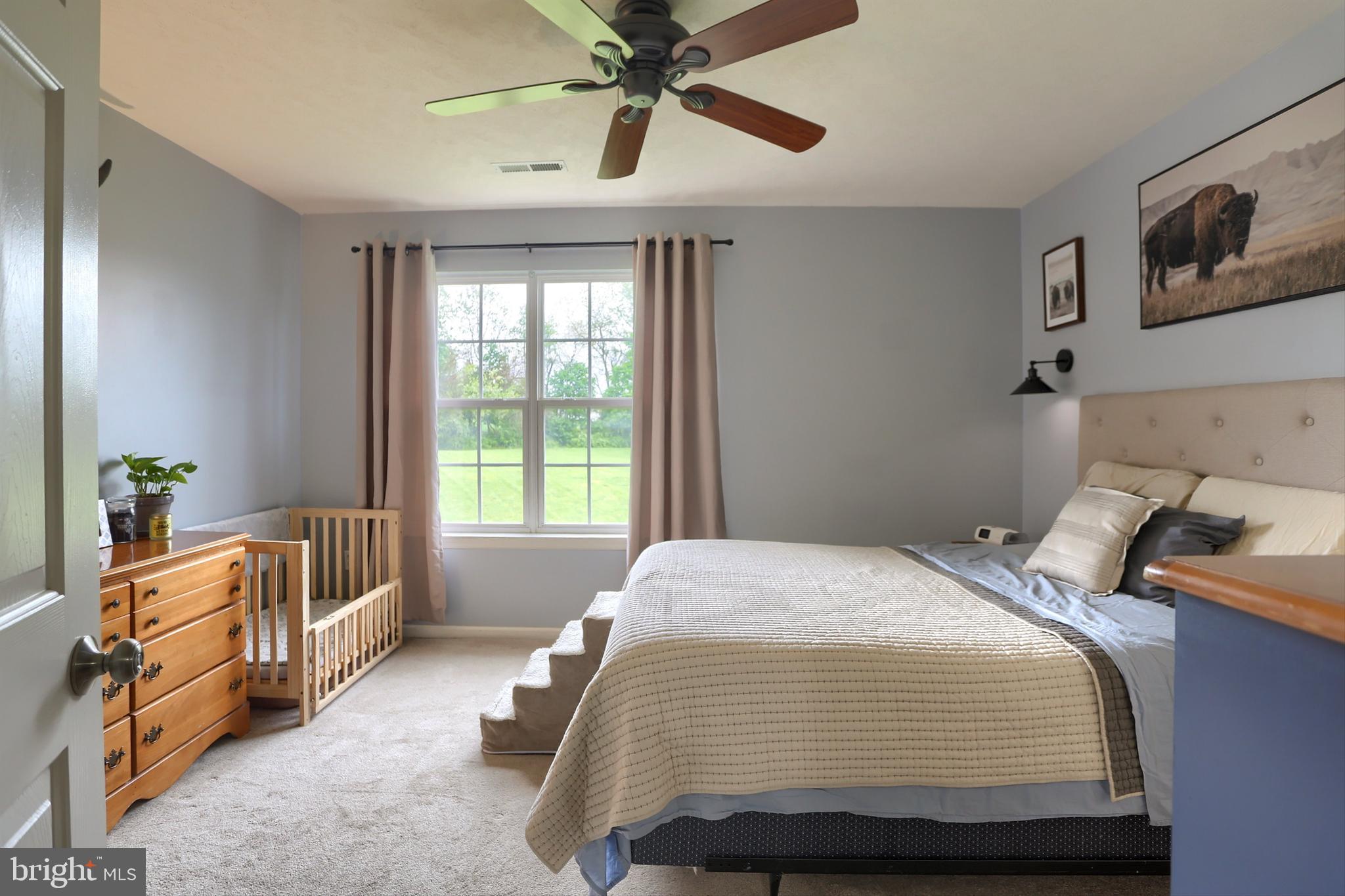 120 East Beaver Street York, PA 17406 - Photo 21 of 41 a bedroom with a bed and a window