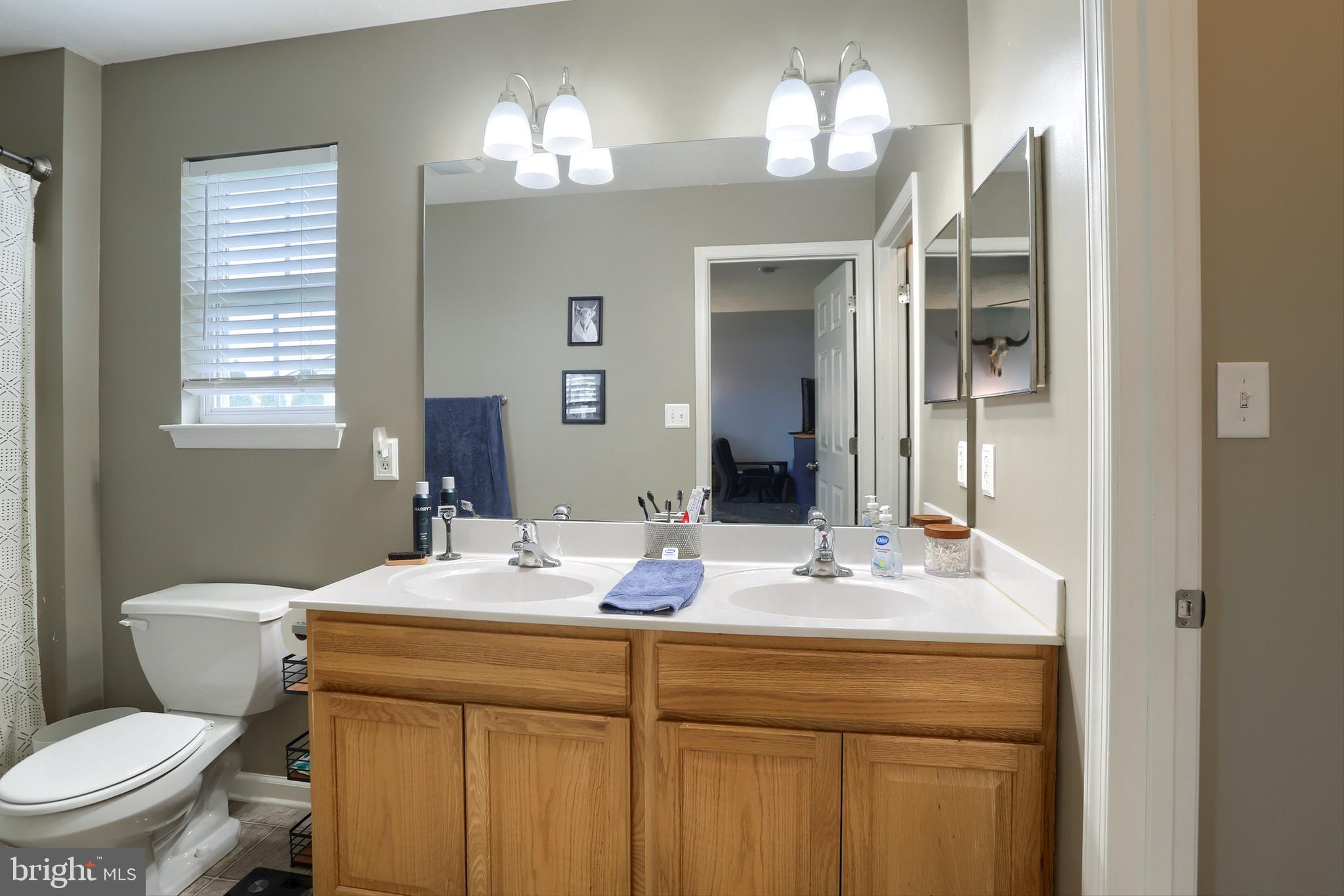 120 East Beaver Street York, PA 17406 - Photo 24 of 41 a bathroom with a sink and a mirror
