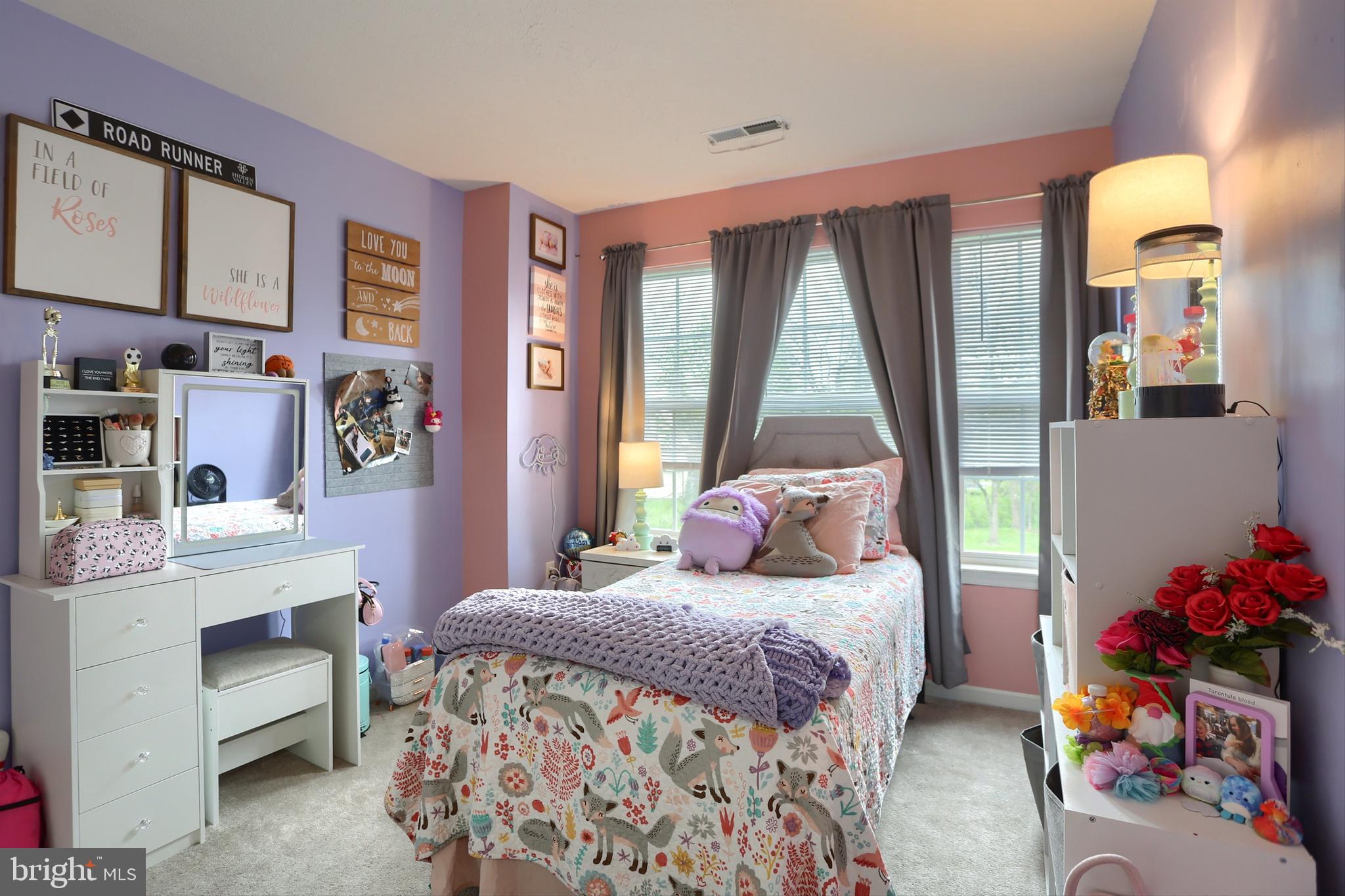 120 East Beaver Street York, PA 17406 - Photo 26 of 41 a bedroom with a bed and large windows