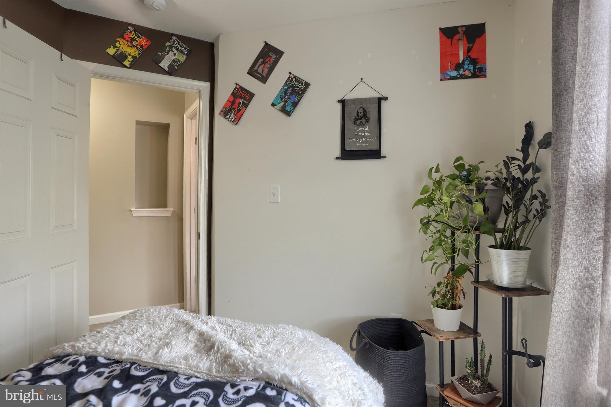 120 East Beaver Street York, PA 17406 - Photo 30 of 41 a bedroom with a bed and a potted plant