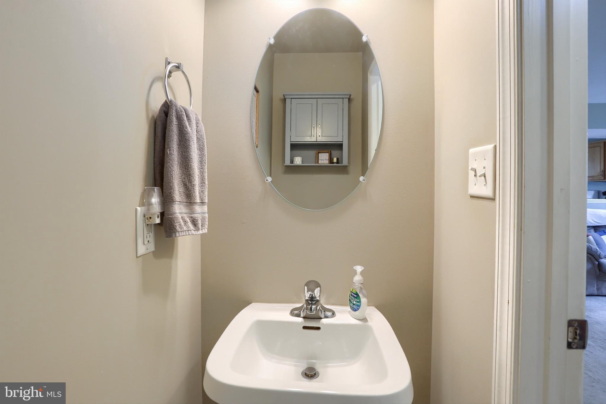 120 East Beaver Street York, PA 17406 - Photo 9 of 41 a bathroom with a sink and a mirror