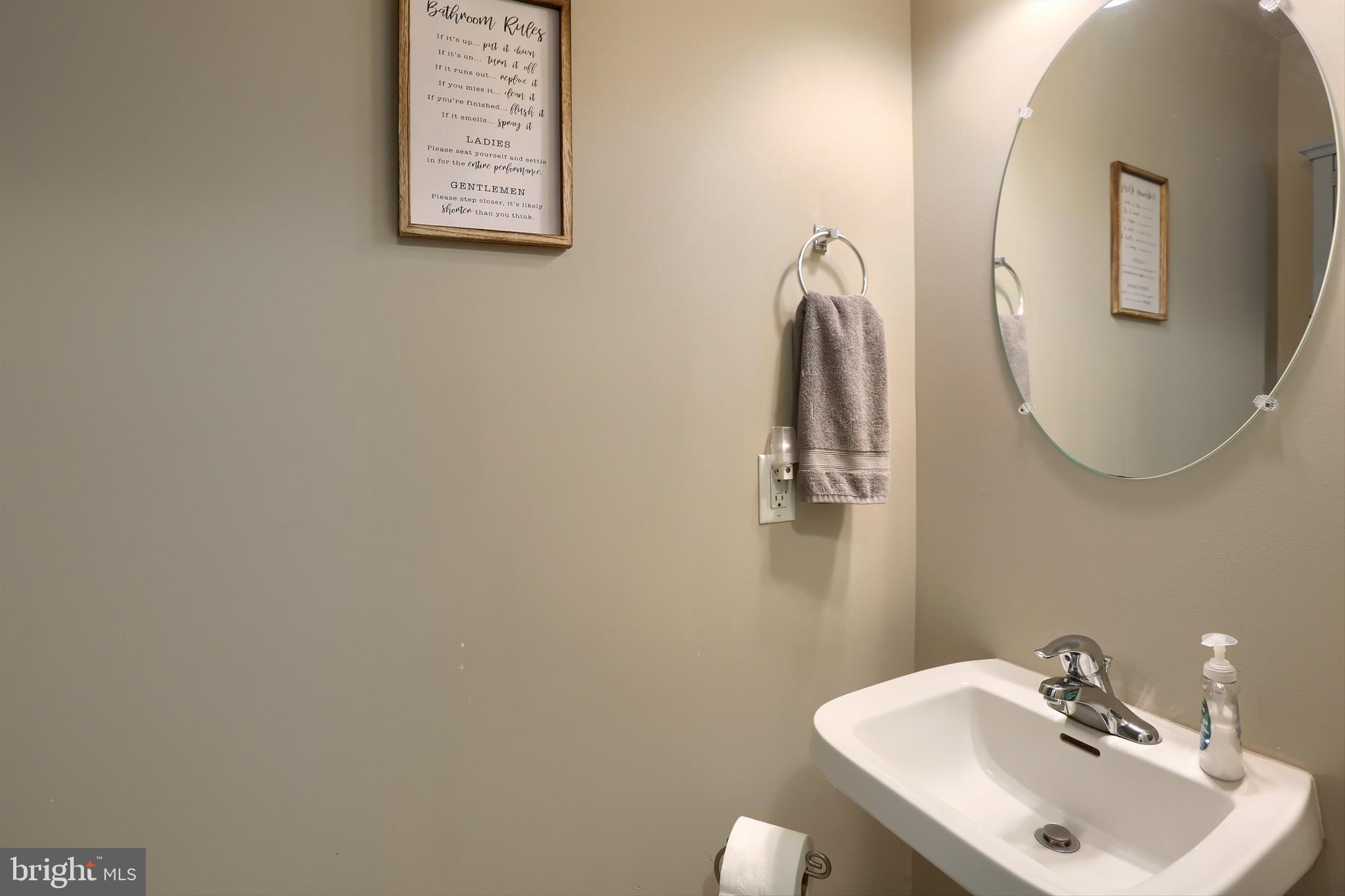 120 East Beaver Street York, PA 17406 - Photo 10 of 41 a bathroom with a sink and a mirror