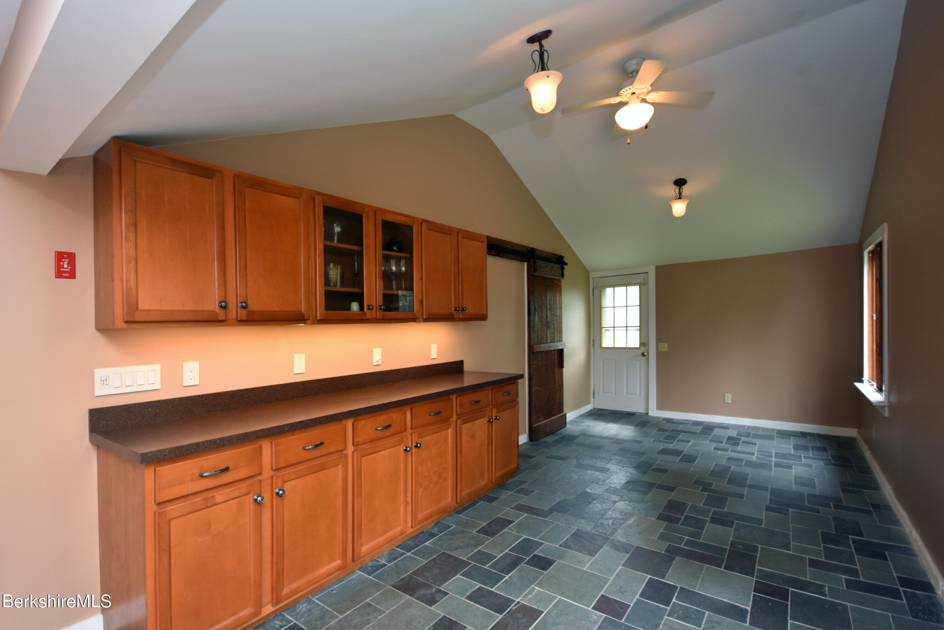 110 Tyringham Road Lee, MA 01238 - Photo 12 of 60 a view of a kitchen with a sink and cabinets