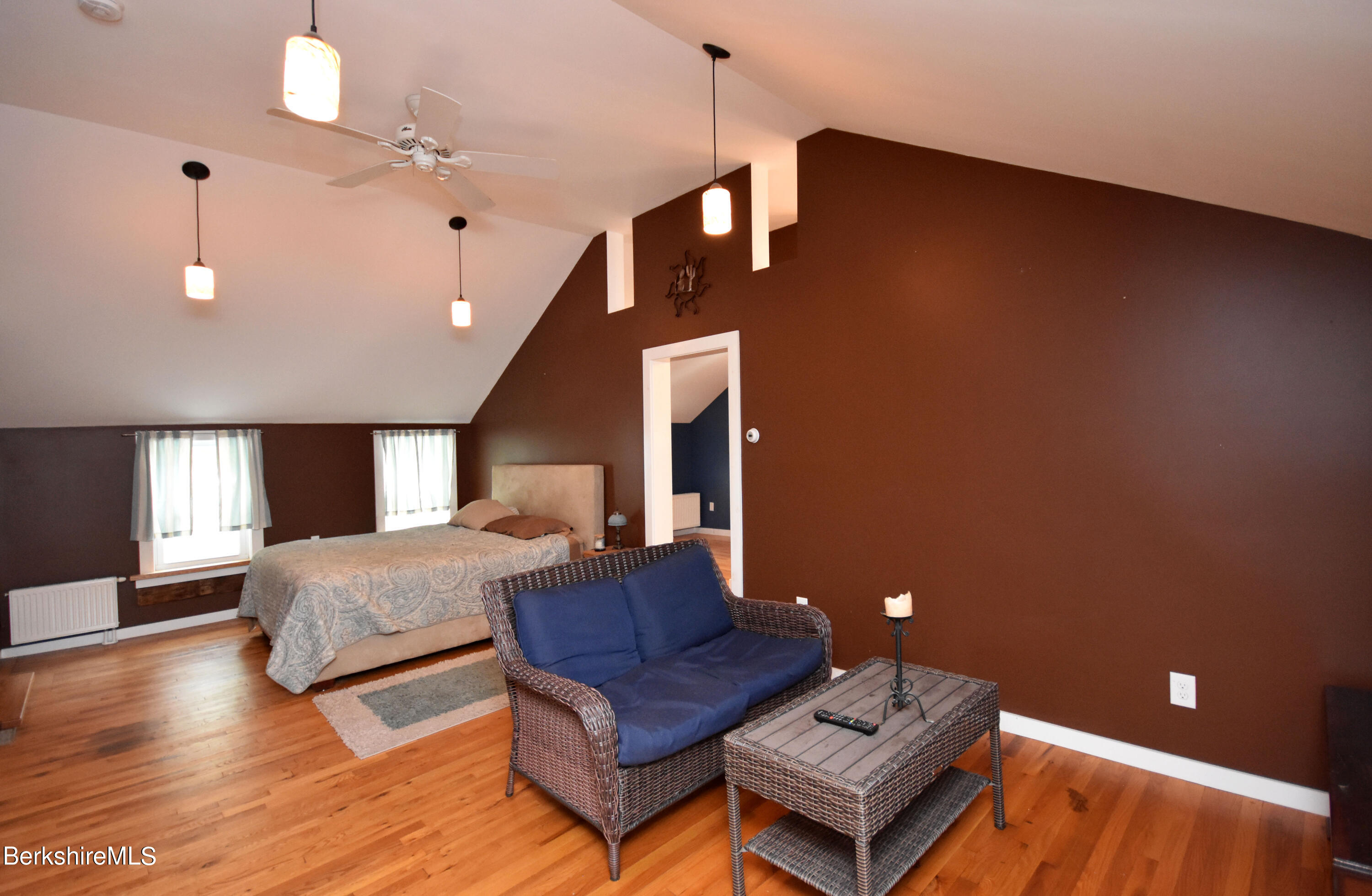 110 Tyringham Road Lee, MA 01238 - Photo 28 of 60 a living room with furniture and a ceiling fan
