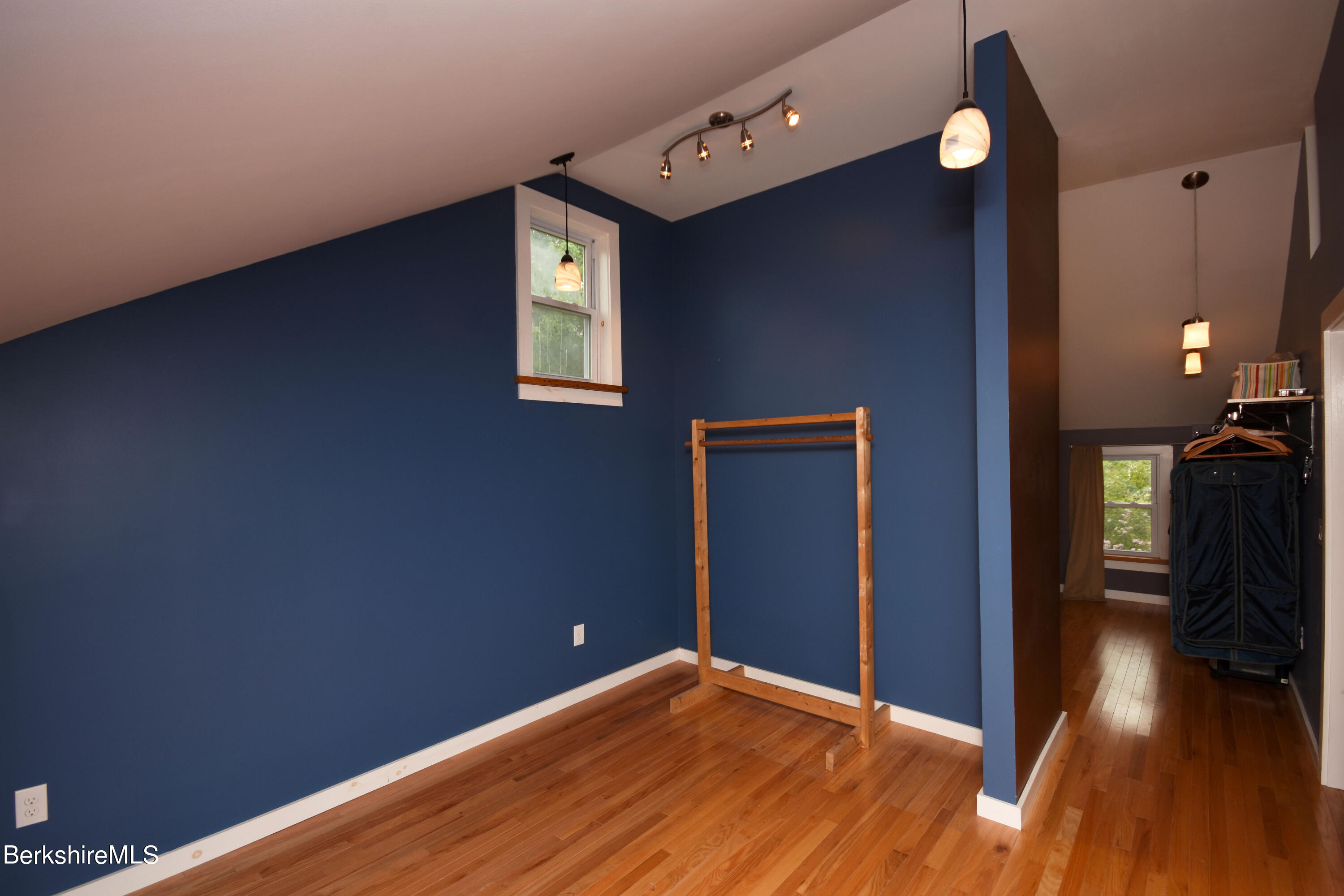 110 Tyringham Road Lee, MA 01238 - Photo 36 of 60 a view of a livingroom with wooden floor