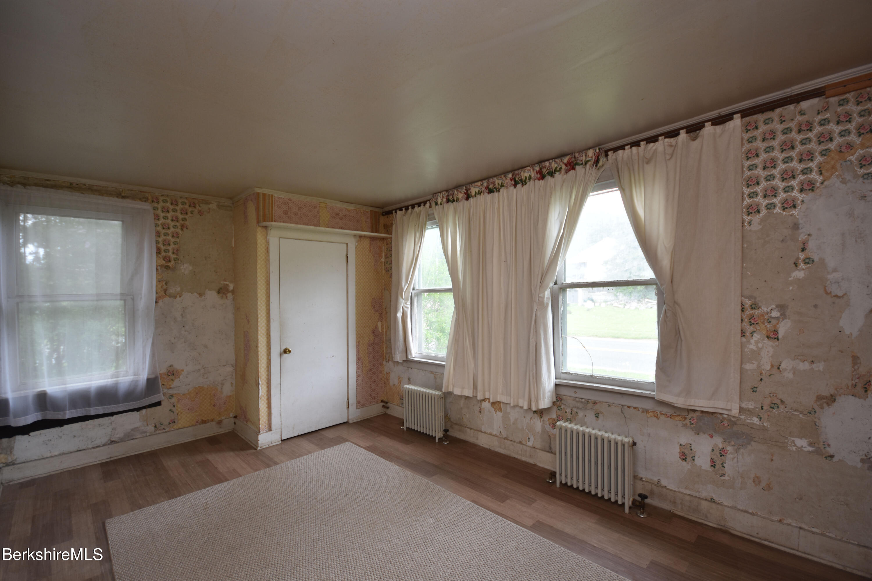 110 Tyringham Road Lee, MA 01238 - Photo 41 of 60 an empty room with windows