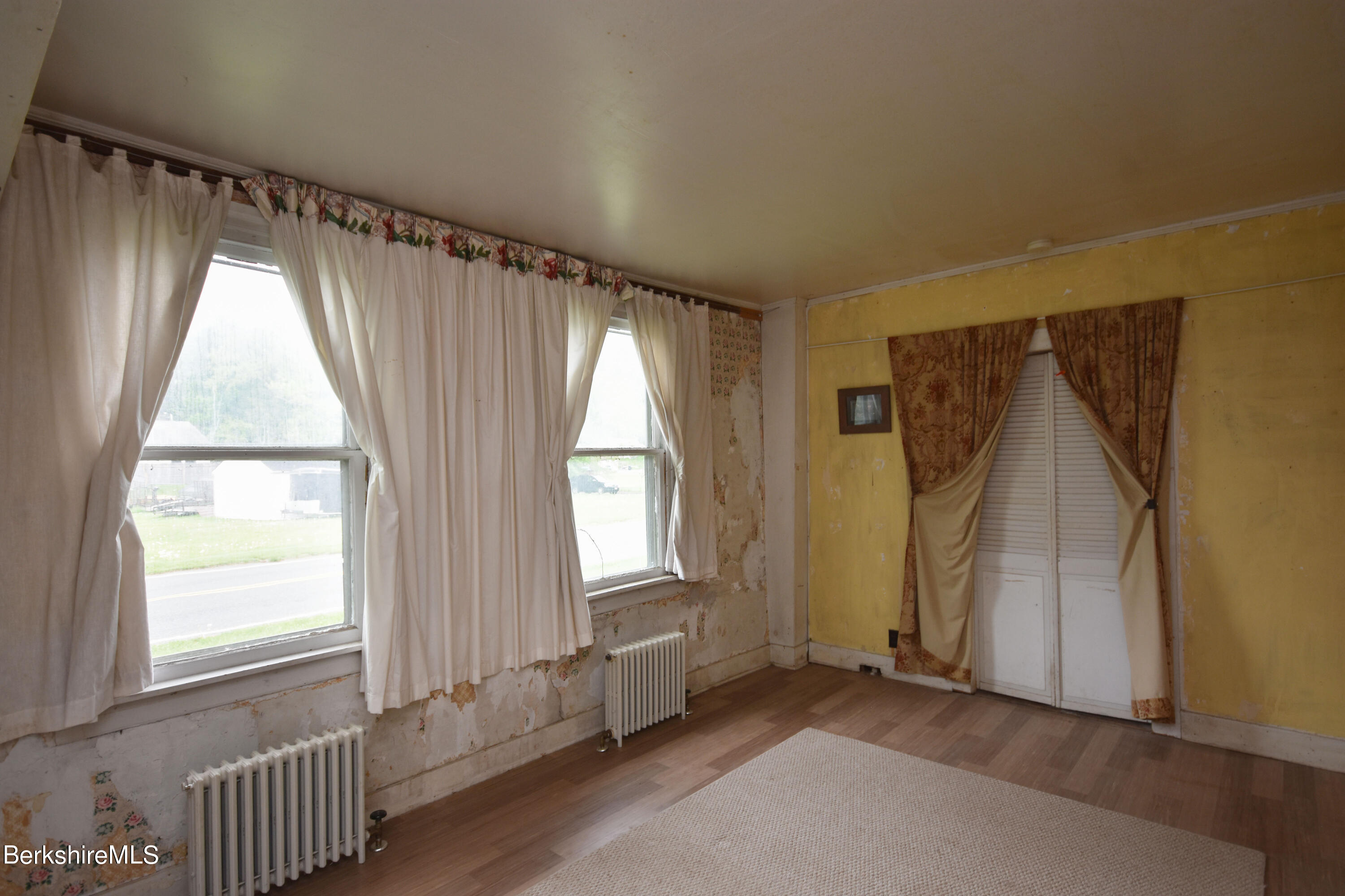 110 Tyringham Road Lee, MA 01238 - Photo 42 of 60 an empty room with windows