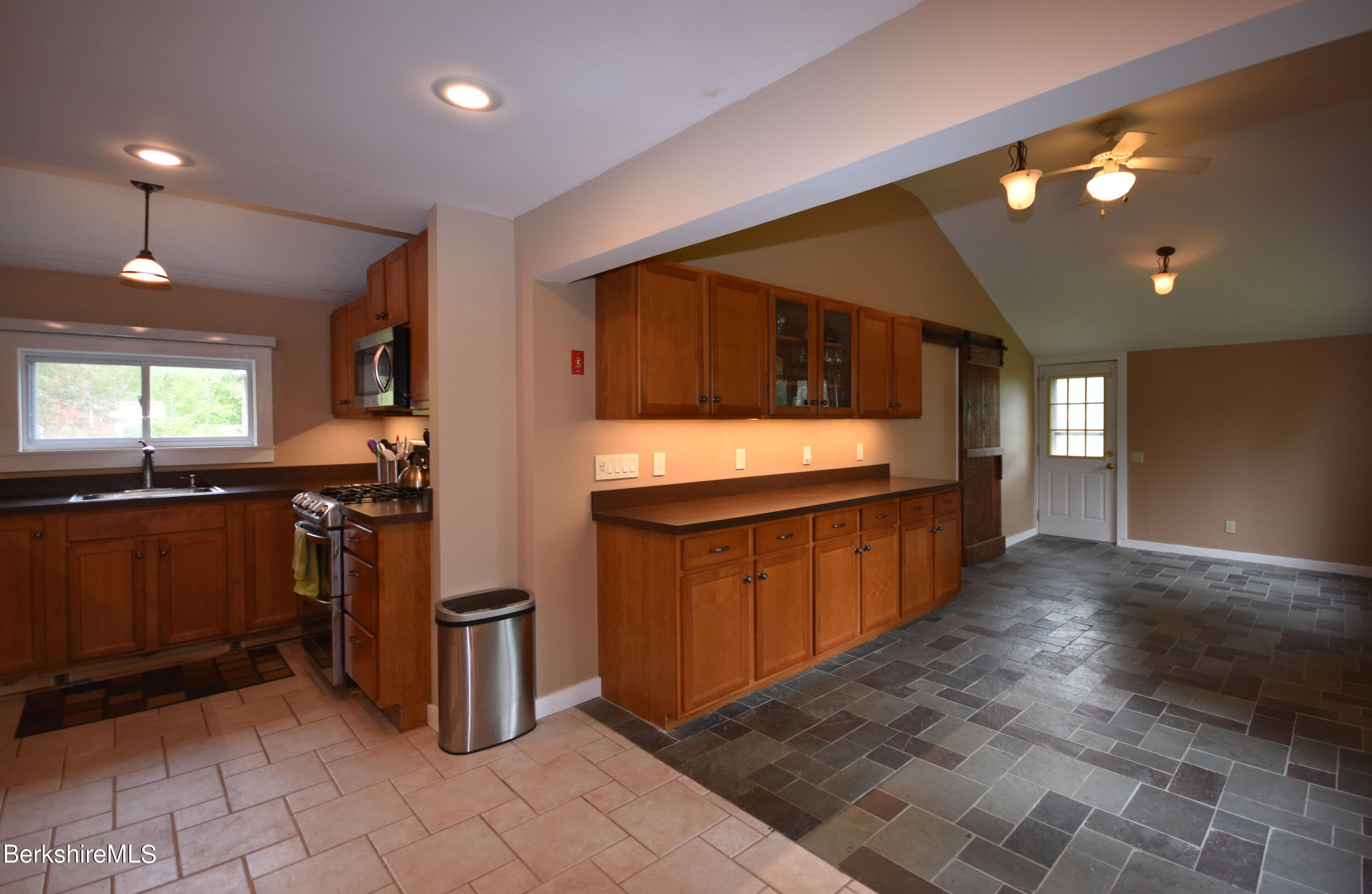 110 Tyringham Road Lee, MA 01238 - Photo 9 of 60 a kitchen with stainless steel appliances granite countertop a refrigerator and a sink