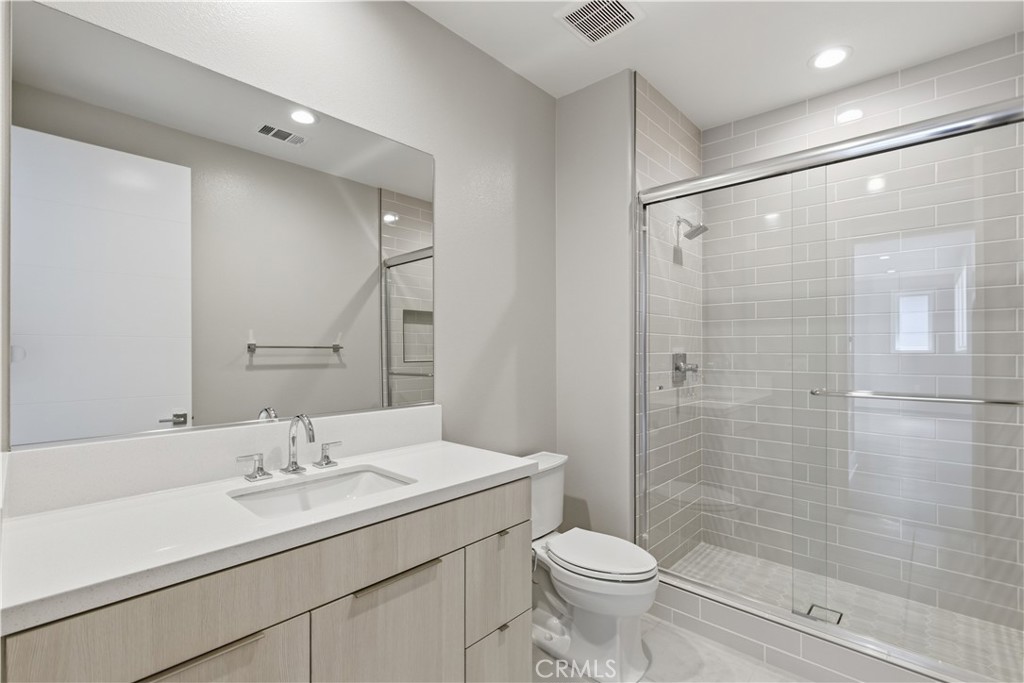 156 Apron Irvine, CA 92618 - Photo 28 of 40 a bathroom with a sink toilet and shower