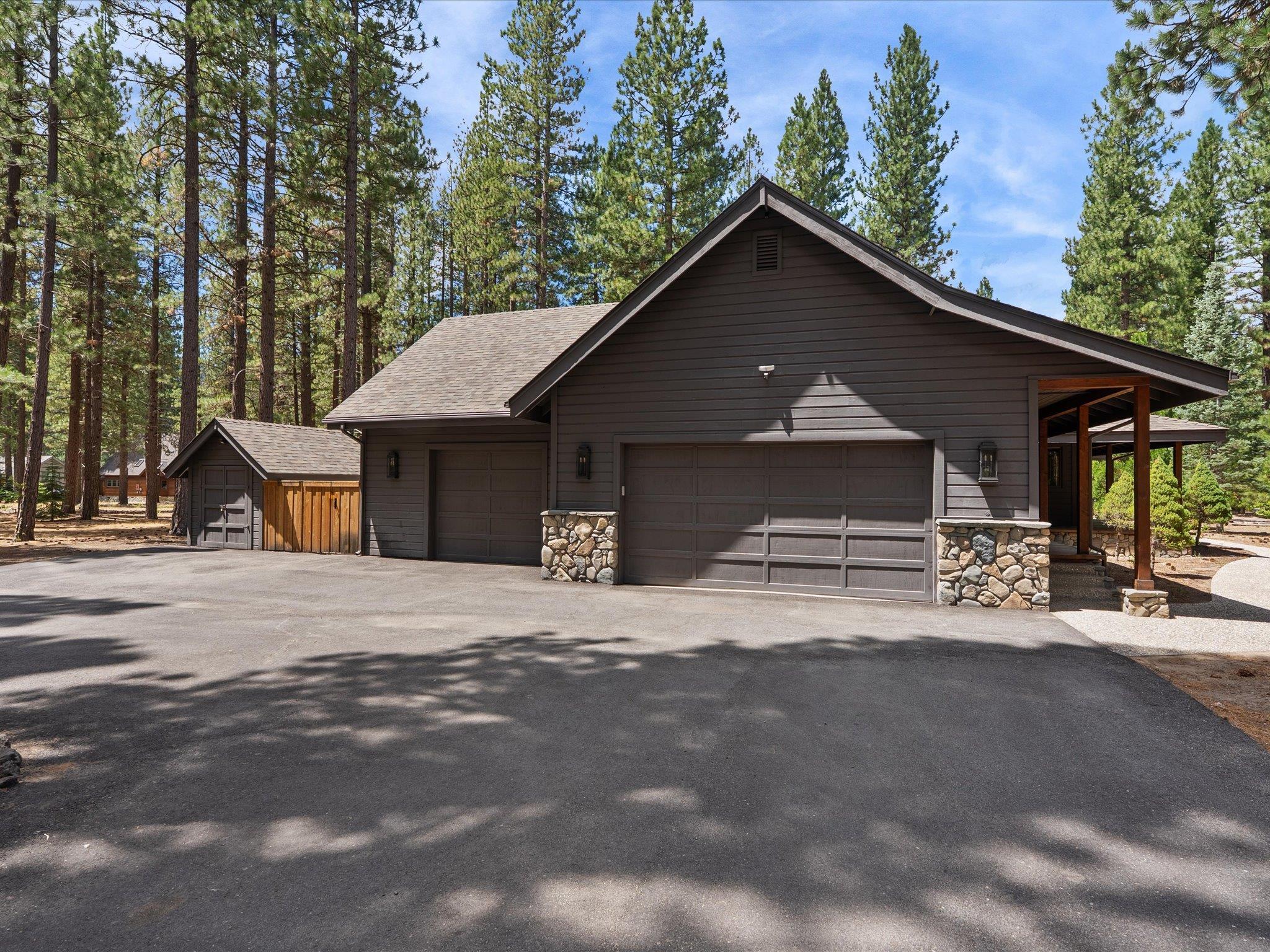 355 Quail View Circle Clio, CA 96106 - Photo 6 of 48 a front view of a house with a garage