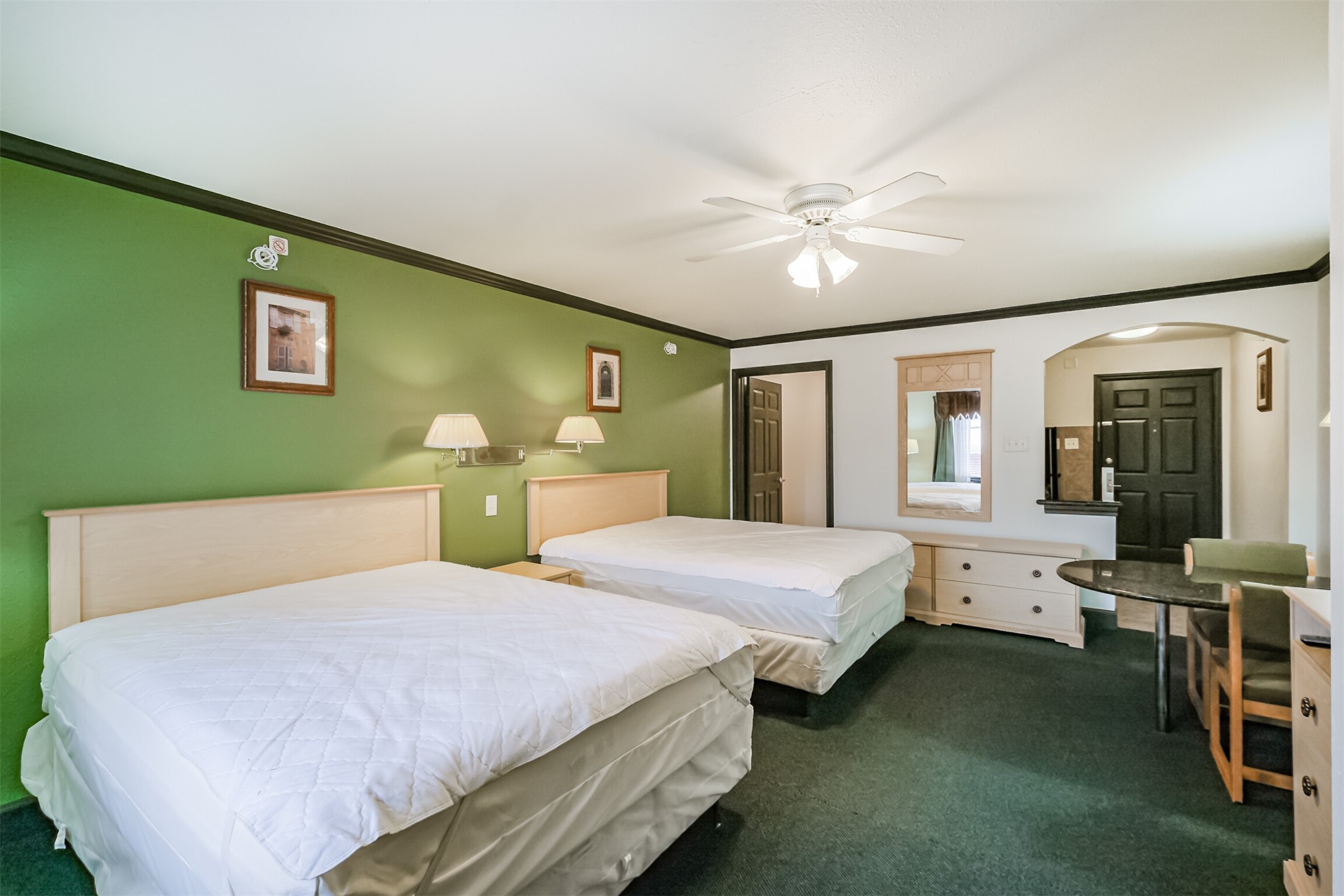 1025 Swanson Street, Unit 210 Houston, TX 77030 - Photo 13 of 19 a bedroom with a bed and window