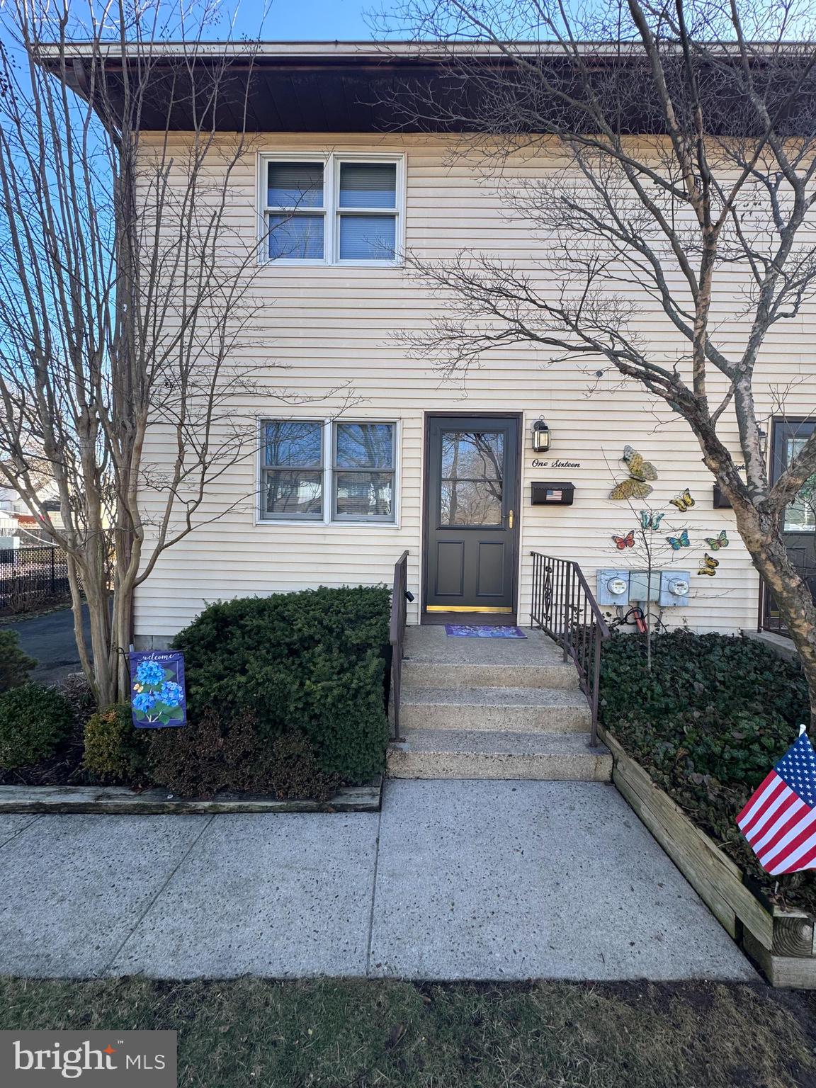 116 Reeger Avenue Hamilton, NJ 08610 - Photo 1 of 25 a front view of a house with a yard and garage
