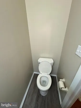 a bathroom with a toilet and a sink