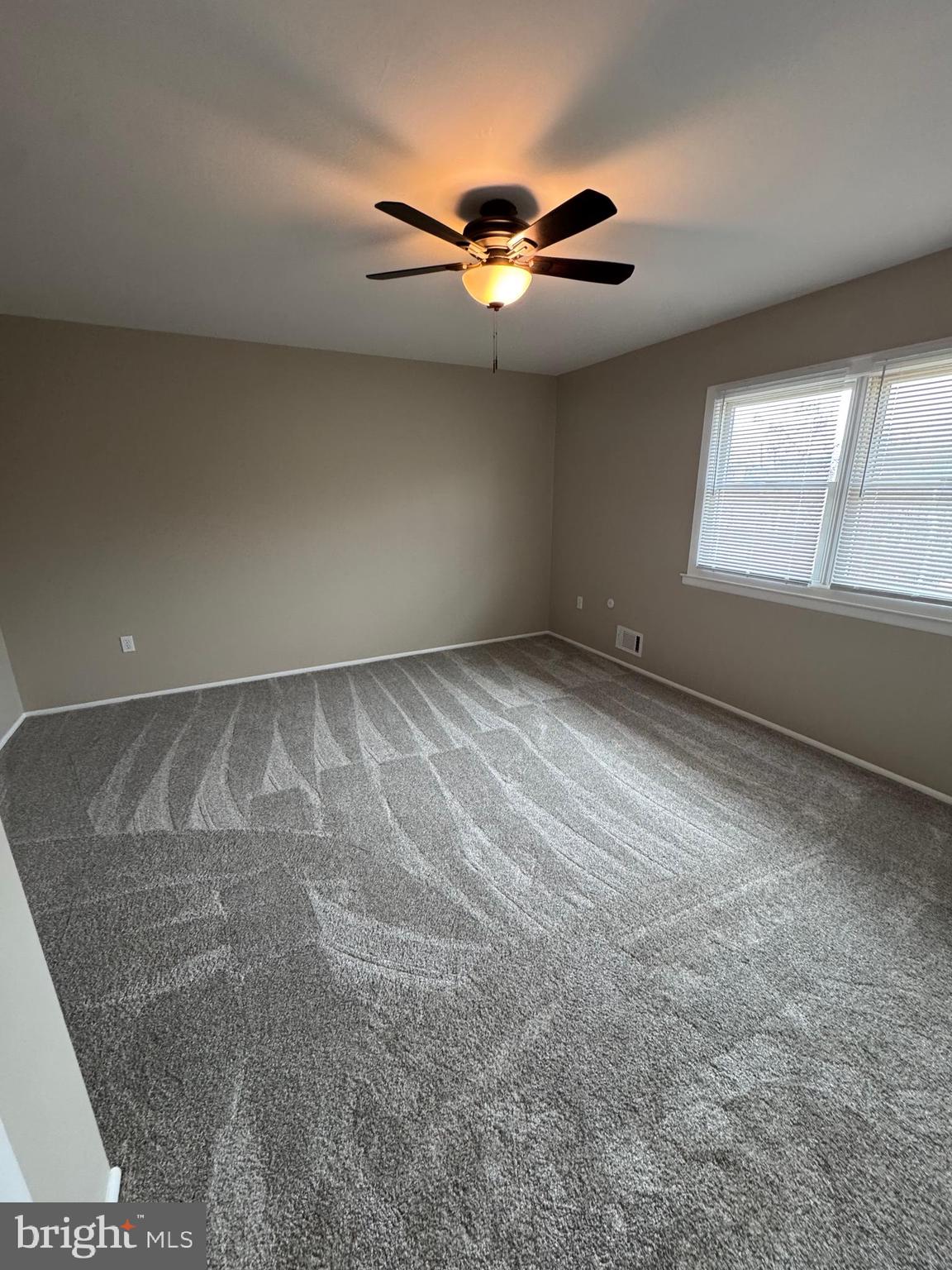 116 Reeger Avenue Hamilton, NJ 08610 - Photo 16 of 25 a view of an empty room with a window