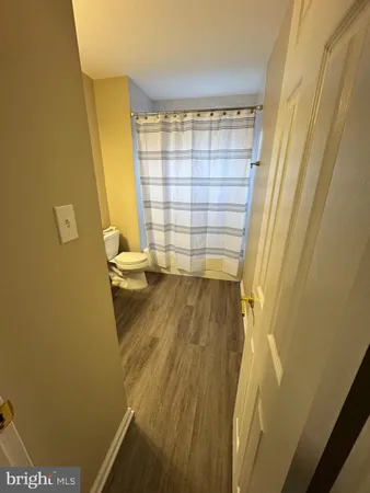 a bathroom with a sink and a shower