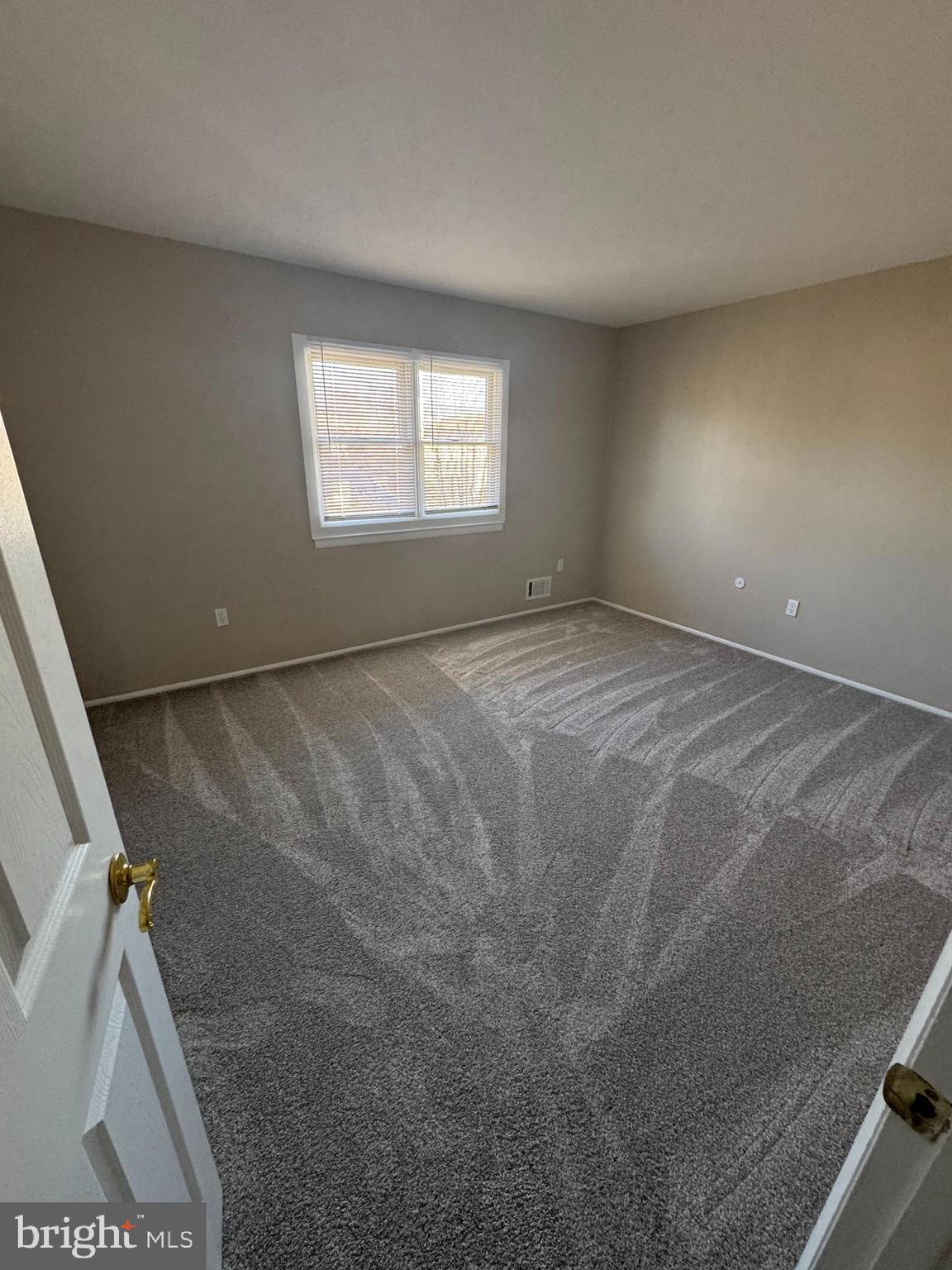 116 Reeger Avenue Hamilton, NJ 08610 - Photo 23 of 25 a view of an empty room with a window