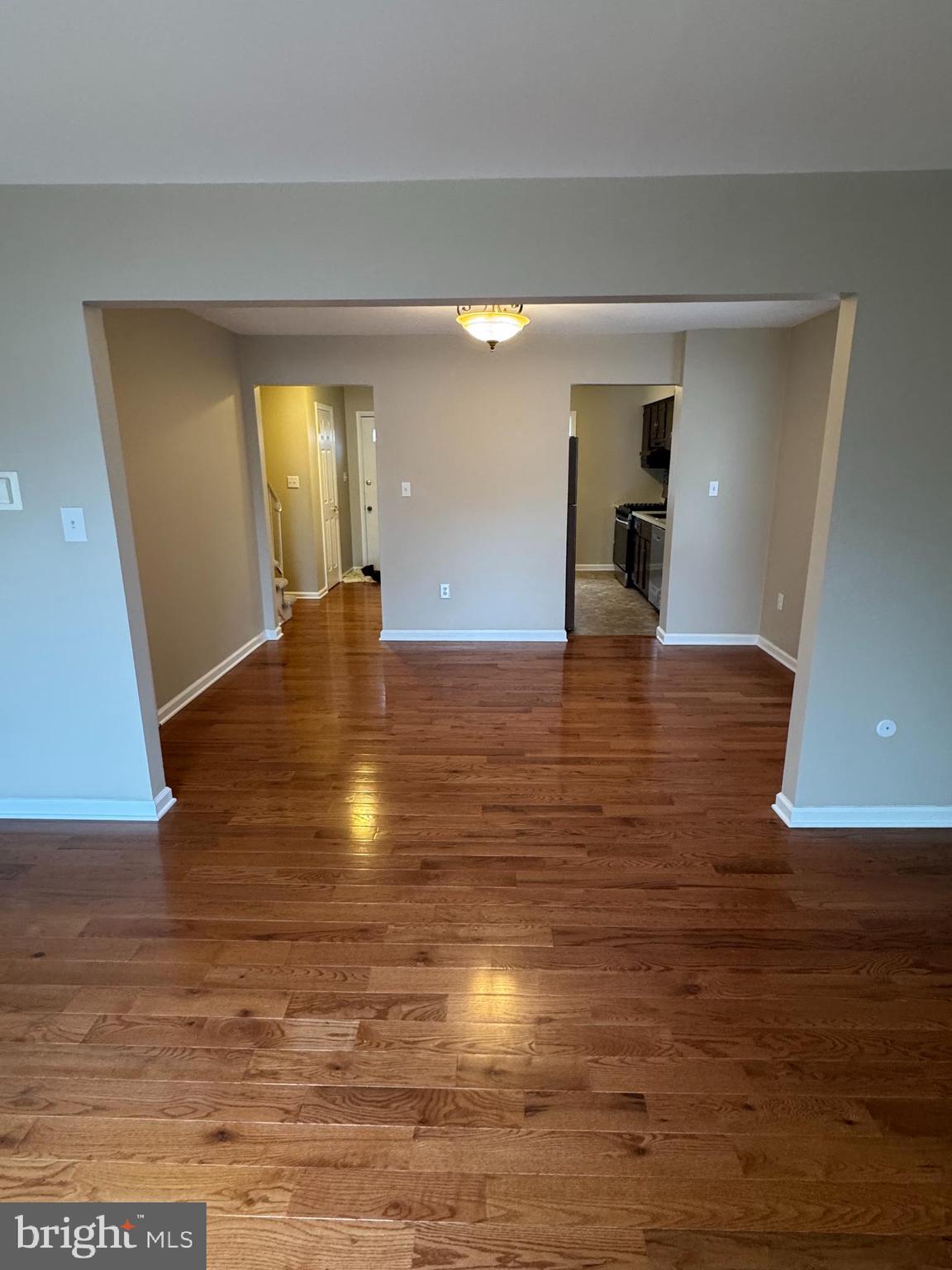 116 Reeger Avenue Hamilton, NJ 08610 - Photo 10 of 25 a view of a living room with an empty room