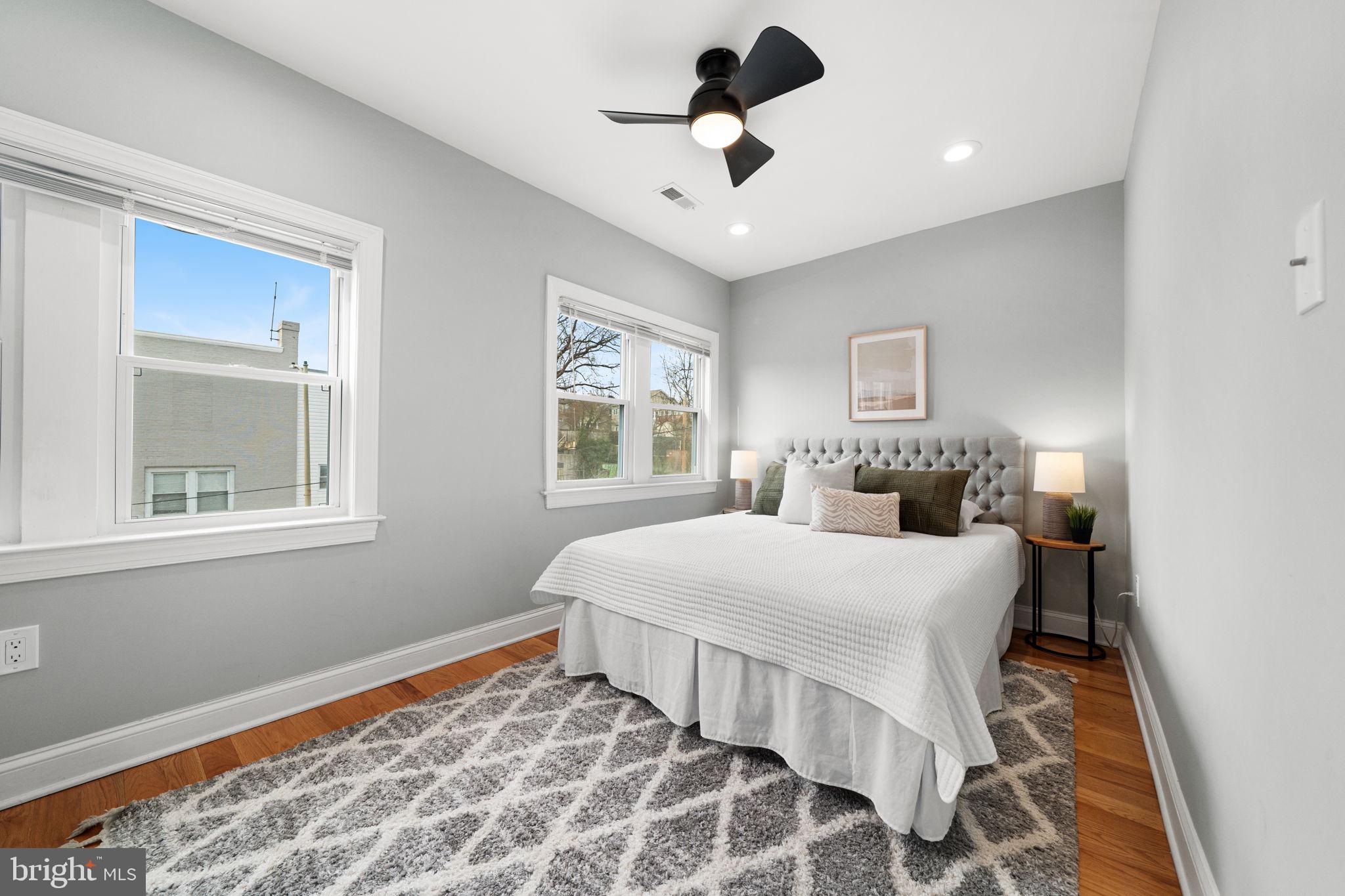 5302 7th Street Northwest Washington, DC 20011 - Photo 22 of 45 a bedroom with a bed and a window