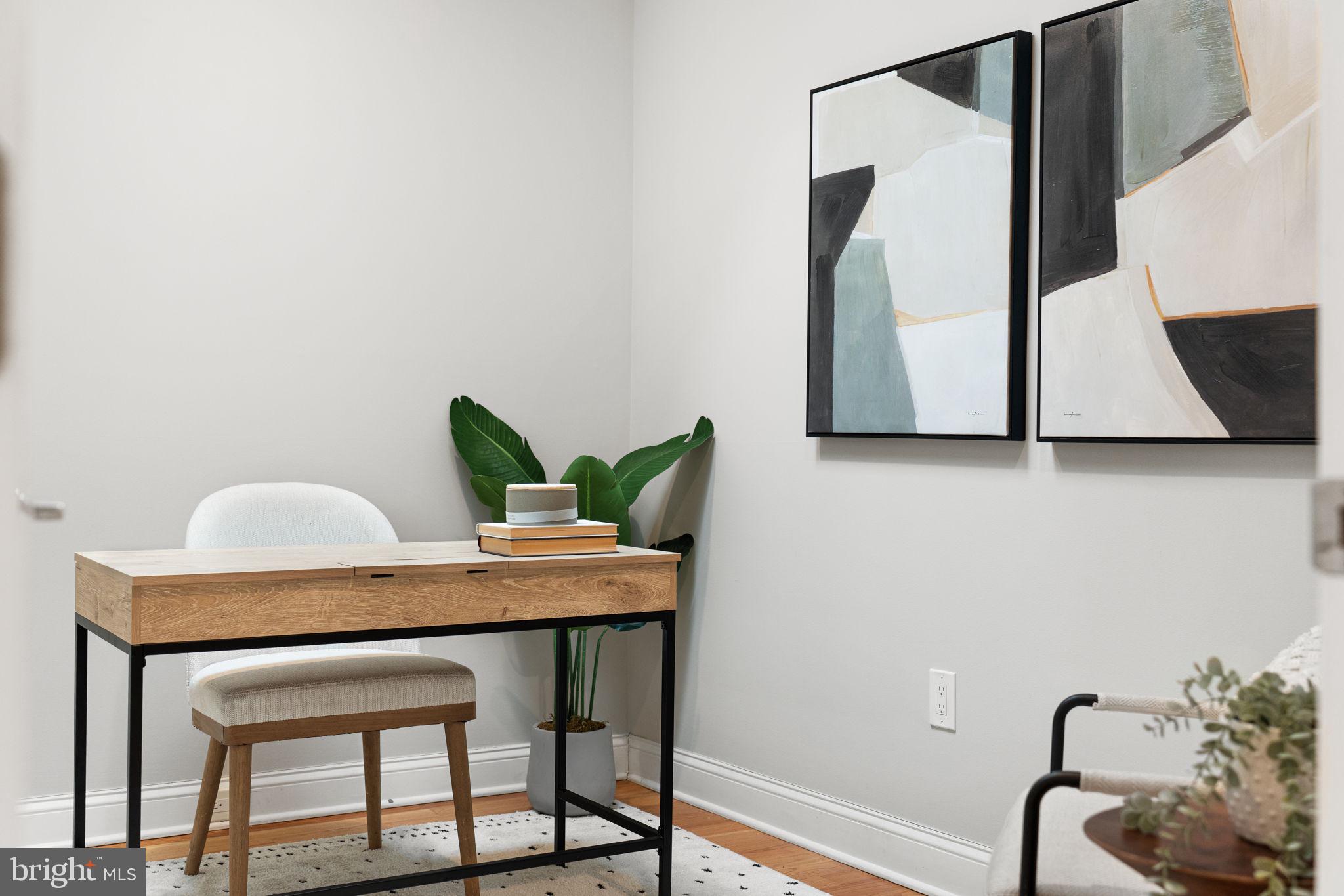 5302 7th Street Northwest Washington, DC 20011 - Photo 25 of 45 a dining room with furniture and wooden floor
