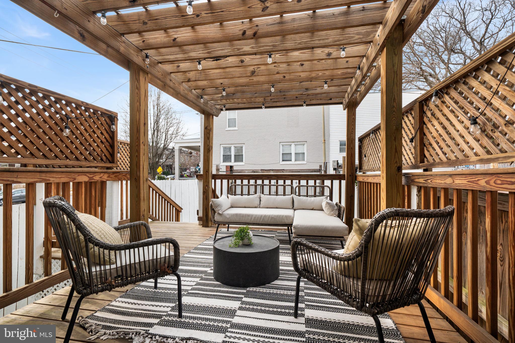 5302 7th Street Northwest Washington, DC 20011 - Photo 35 of 45 a view of a patio with couches chairs and wooden floor