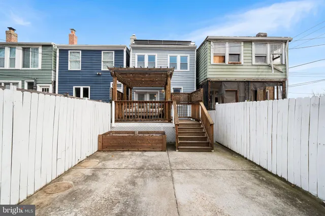 a front view of a house with stairs