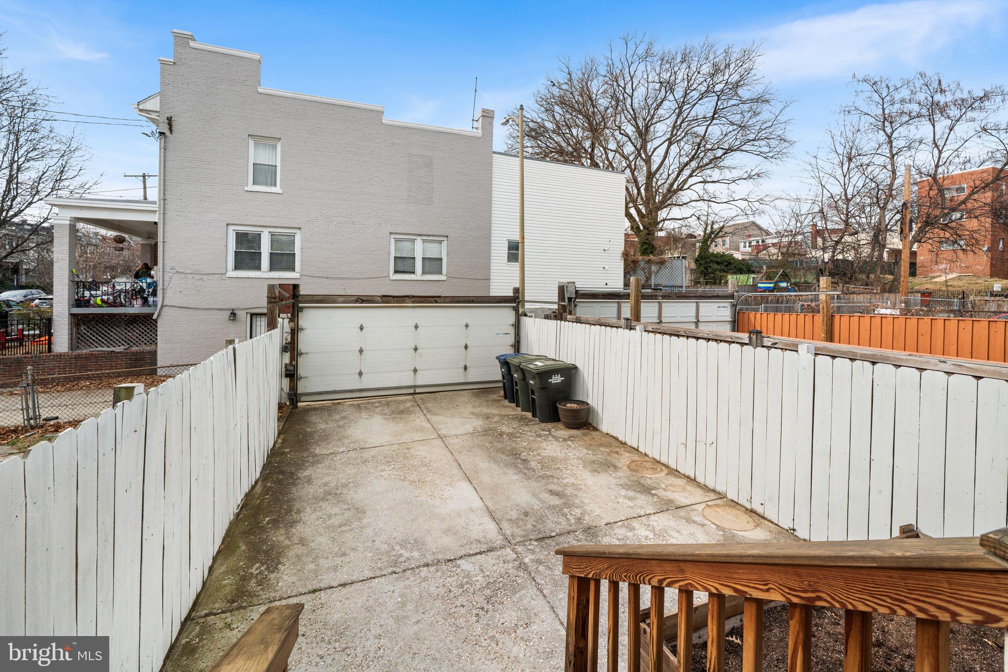 5302 7th Street Northwest Washington, DC 20011 - Photo 38 of 45 a view of a house with a wooden fence