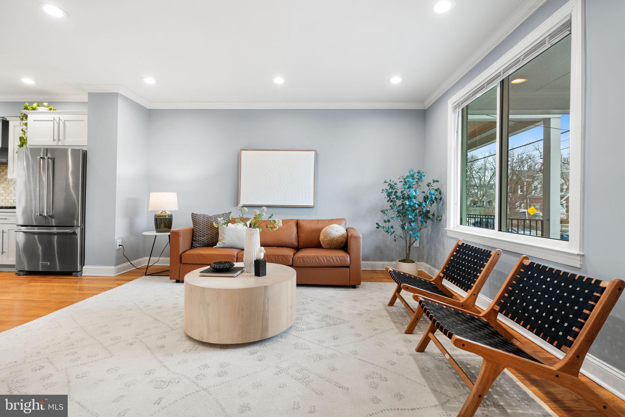 5302 7th Street Northwest Washington, DC 20011 - Photo 4 of 45 a living room with furniture and a window