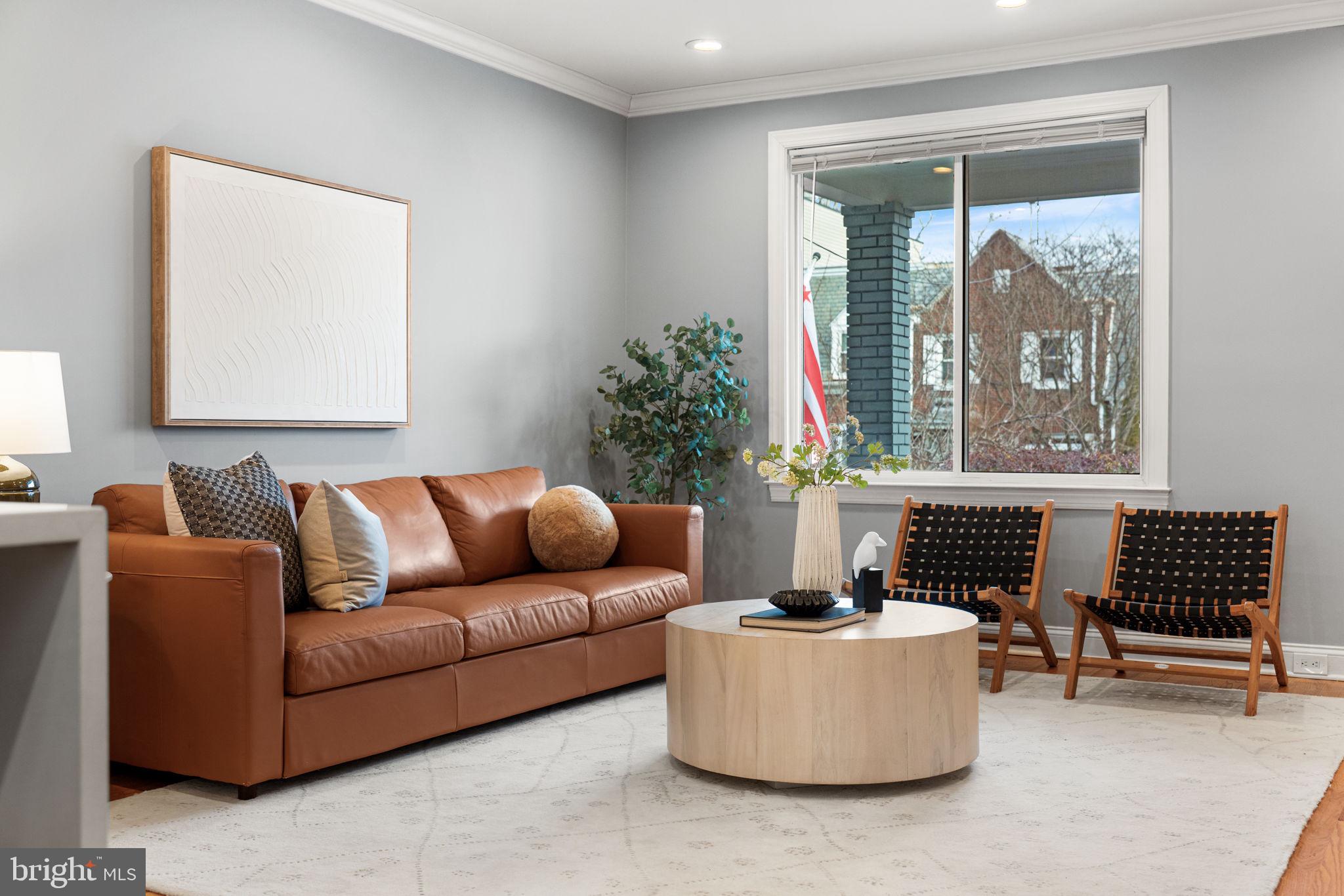 5302 7th Street Northwest Washington, DC 20011 - Photo 7 of 45 a living room with furniture and a large window