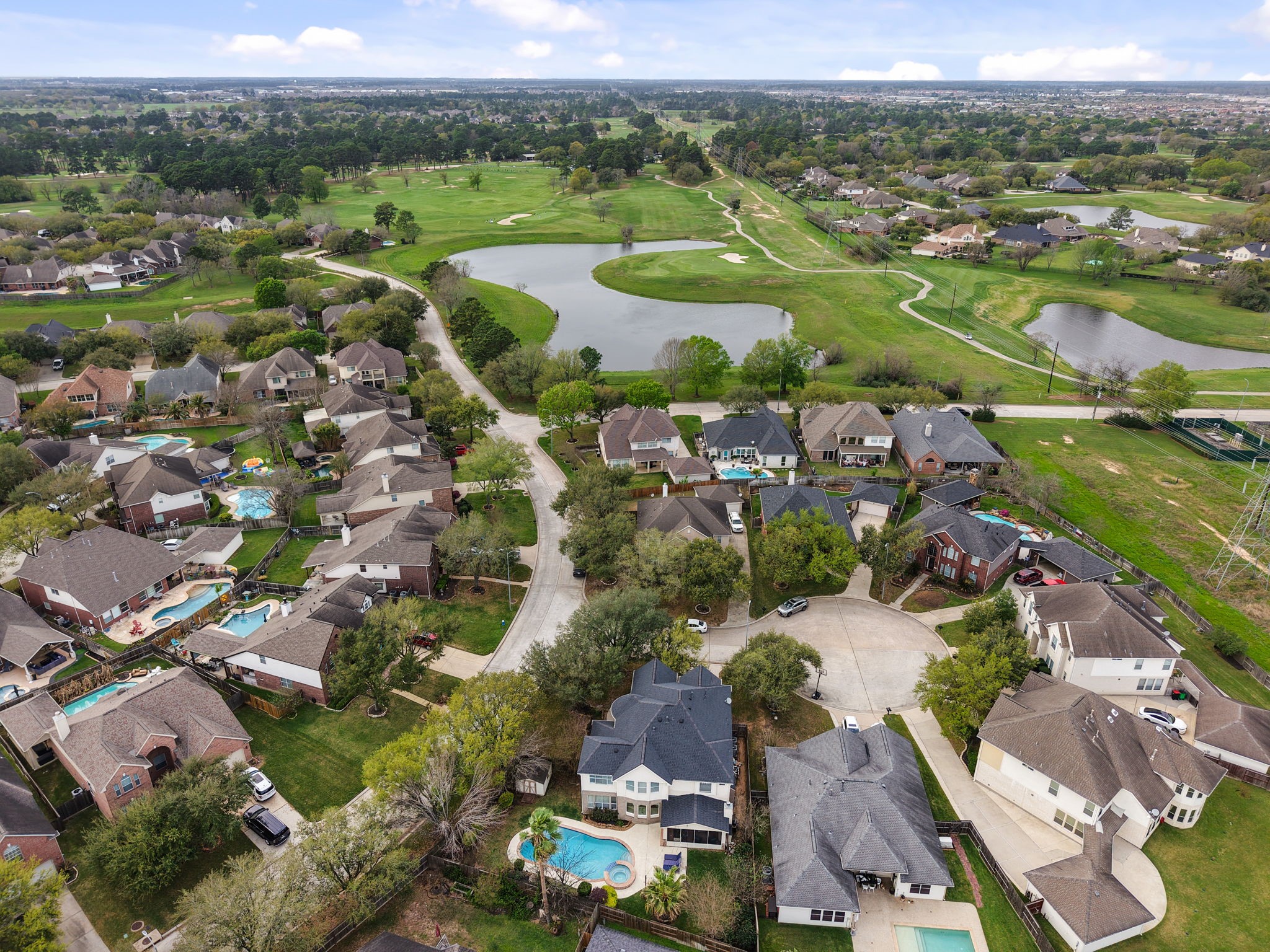 20102 Windbury Court Spring, TX 77379 - Photo 37 of 49 an aerial view of residential houses with outdoor space and river