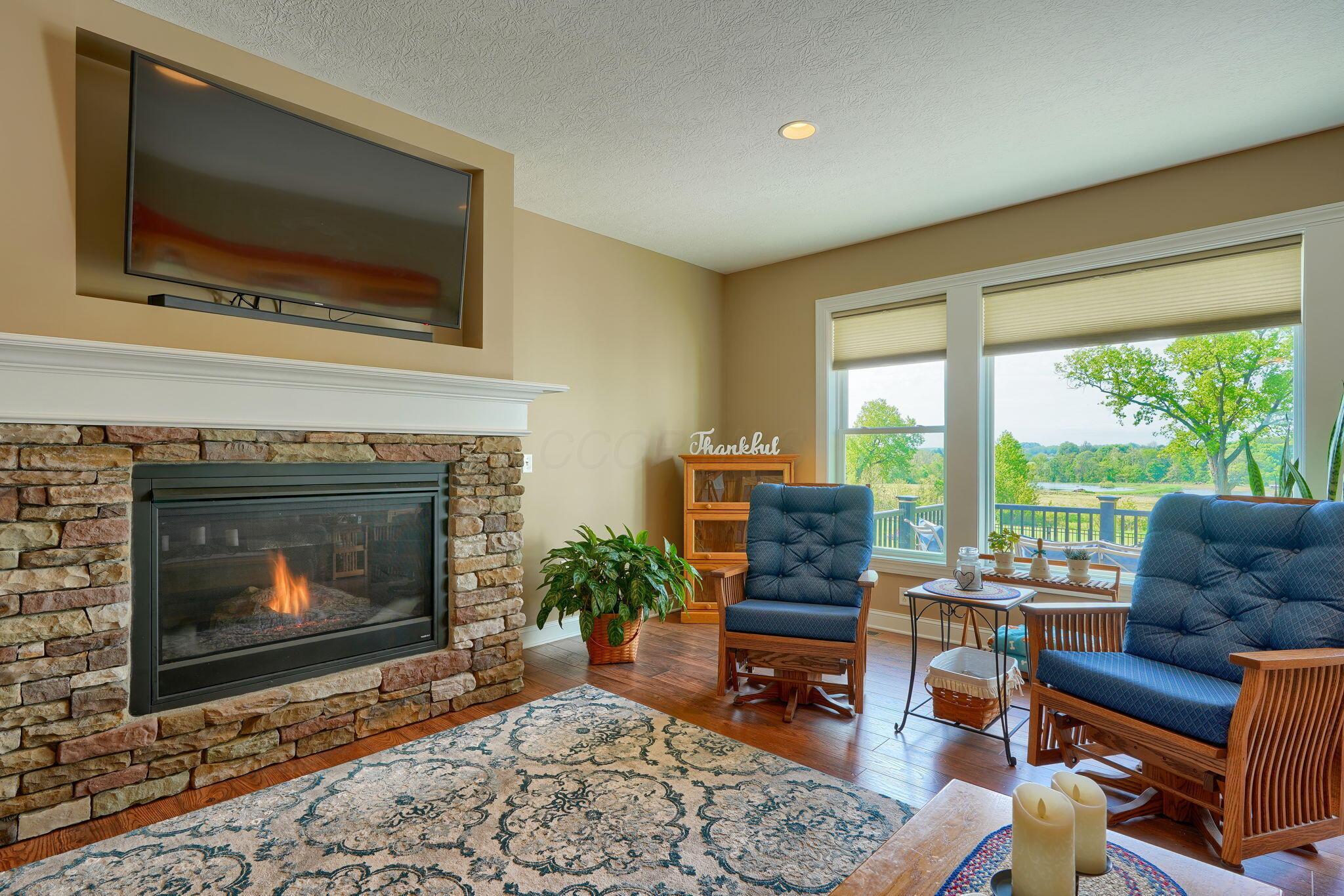 6223 Wilson Road Northwest Lancaster, OH 43130 - Photo 20 of 111 Custom fireplace with stone and custom mantle