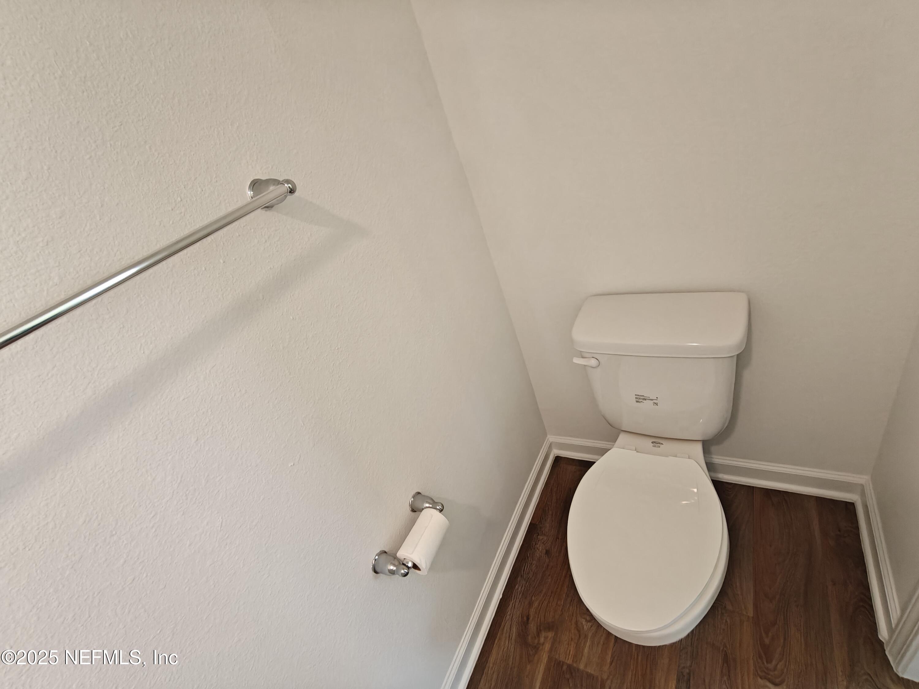 1731 Bridger Trace Middleburg, FL 32068 - Photo 18 of 43 a bathroom with a toilet and a sink