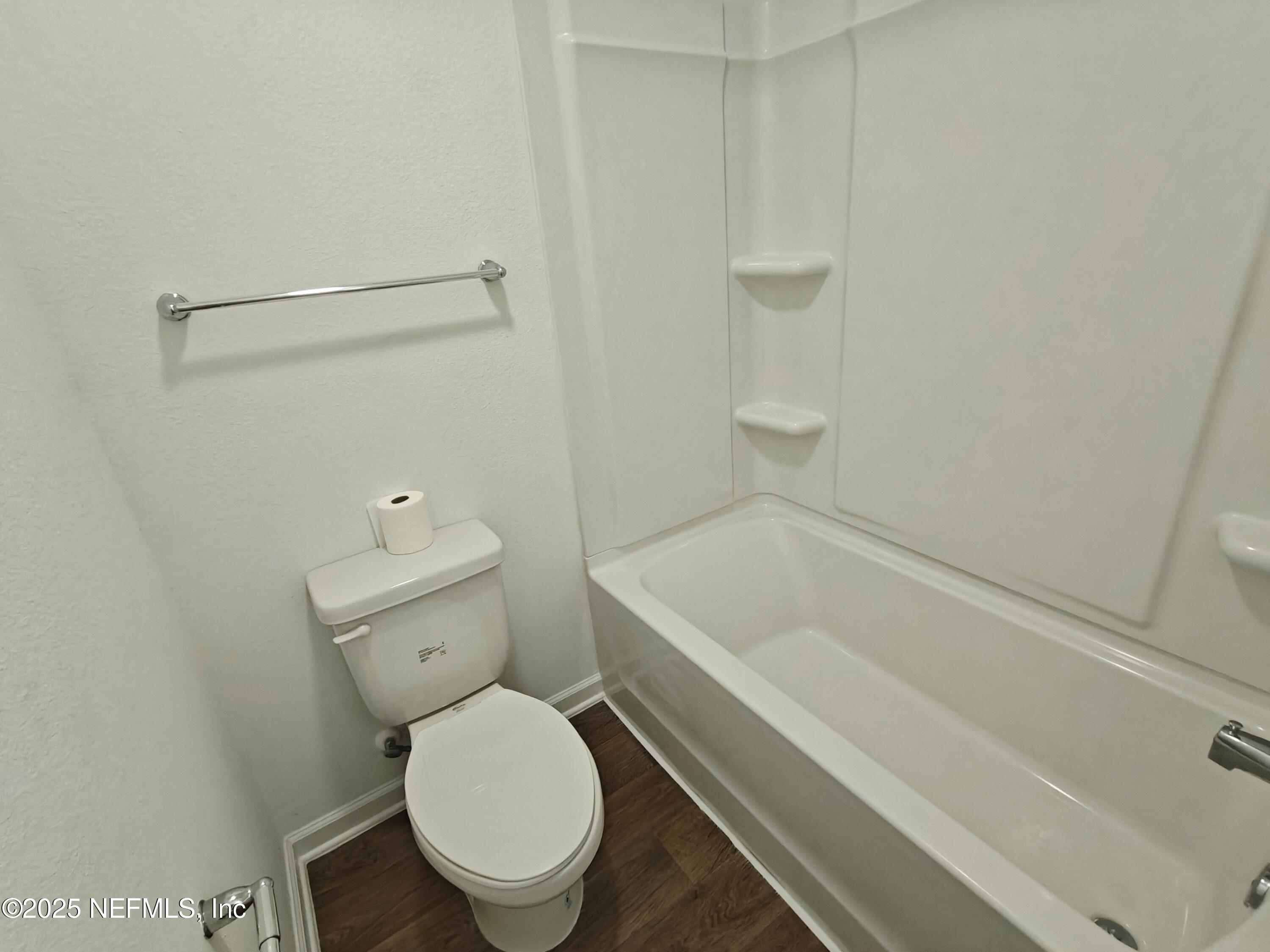 1731 Bridger Trace Middleburg, FL 32068 - Photo 32 of 43 a bathroom with a toilet and a bathtub